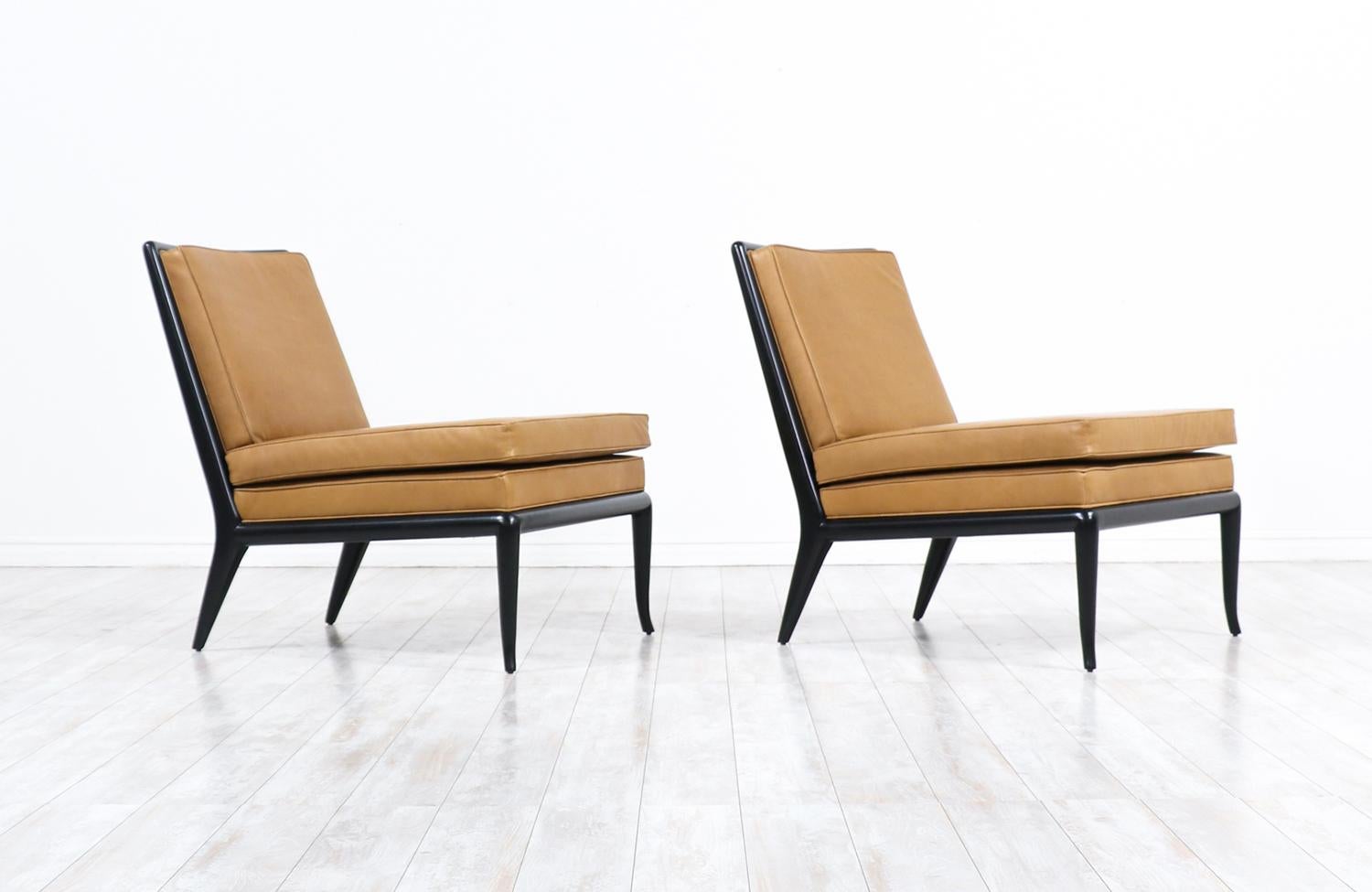 T.H. Robsjohn-Gibbings leather and ebonized wood slipper lounge chairs for Widdicomb.

Introducing the T.H. Robsjohn-Gibbings Leather & Ebonized Wood Slipper Lounge Chairs for Widdicomb, a vintage gem exuding timeless grace. Crafted in the 1950s in