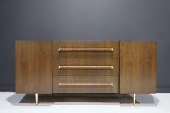 T.H. Robsjohn-Gibbings Rare Sideboard or Cabinet in Walnut, Rattan and Brass
