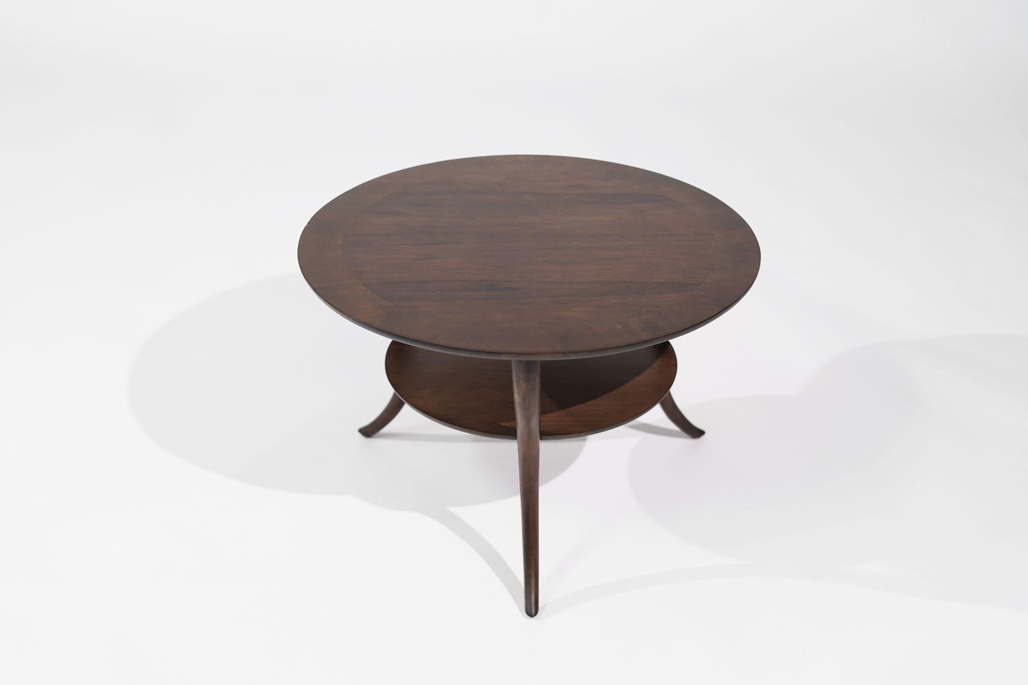Experience the allure of mid-century design with our Vintage Sabre Leg End Table by T.H. Robsjohn-Gibbings for Widdicomb, circa 1950s. Expertly restored and refinished in a warm walnut tone, this timeless piece seamlessly combines mid-century charm
