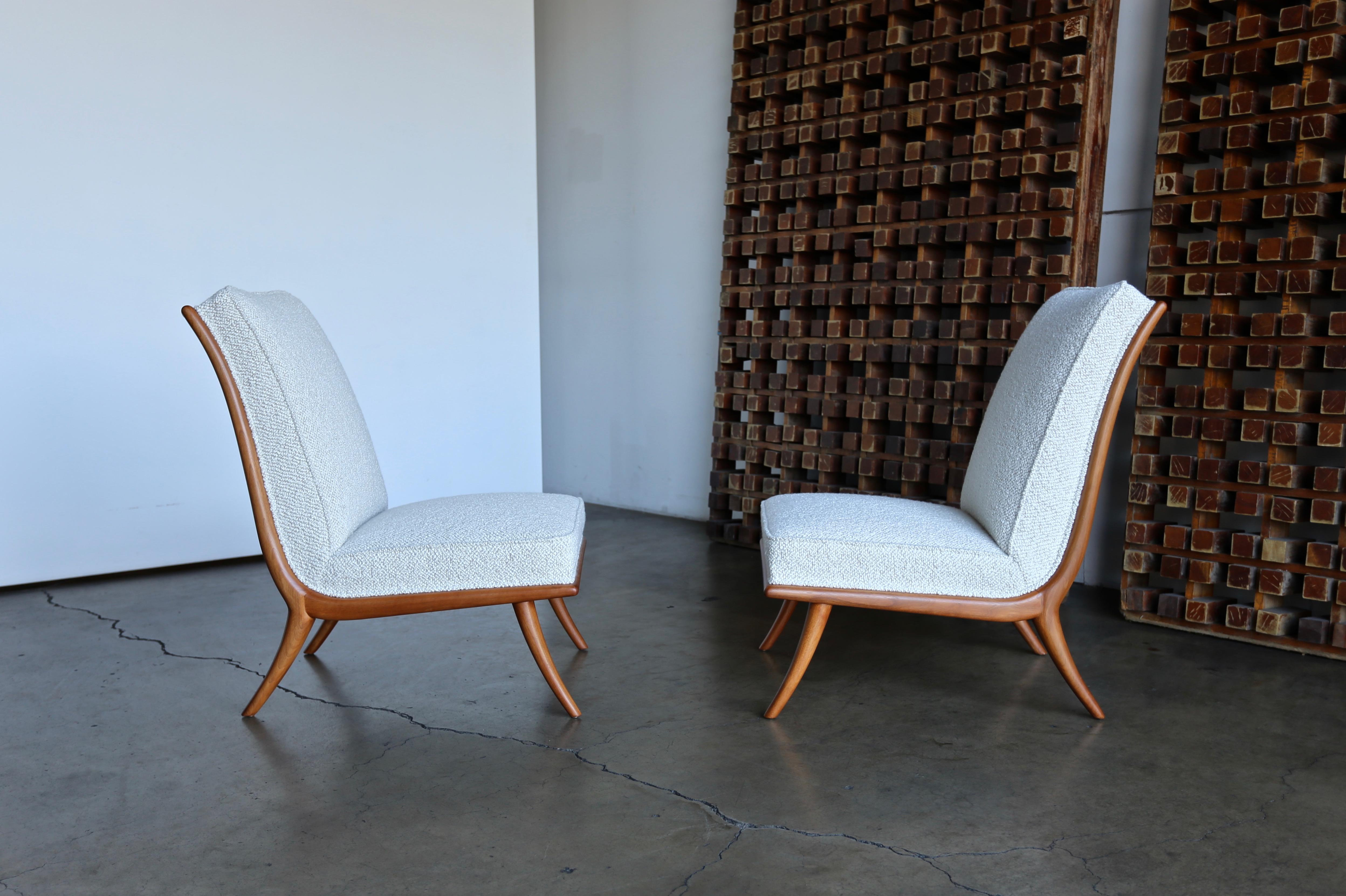 T.H. Robsjohn-Gibbings slipper chairs for Widdicomb, circa 1955. This pair has been professionally restored.