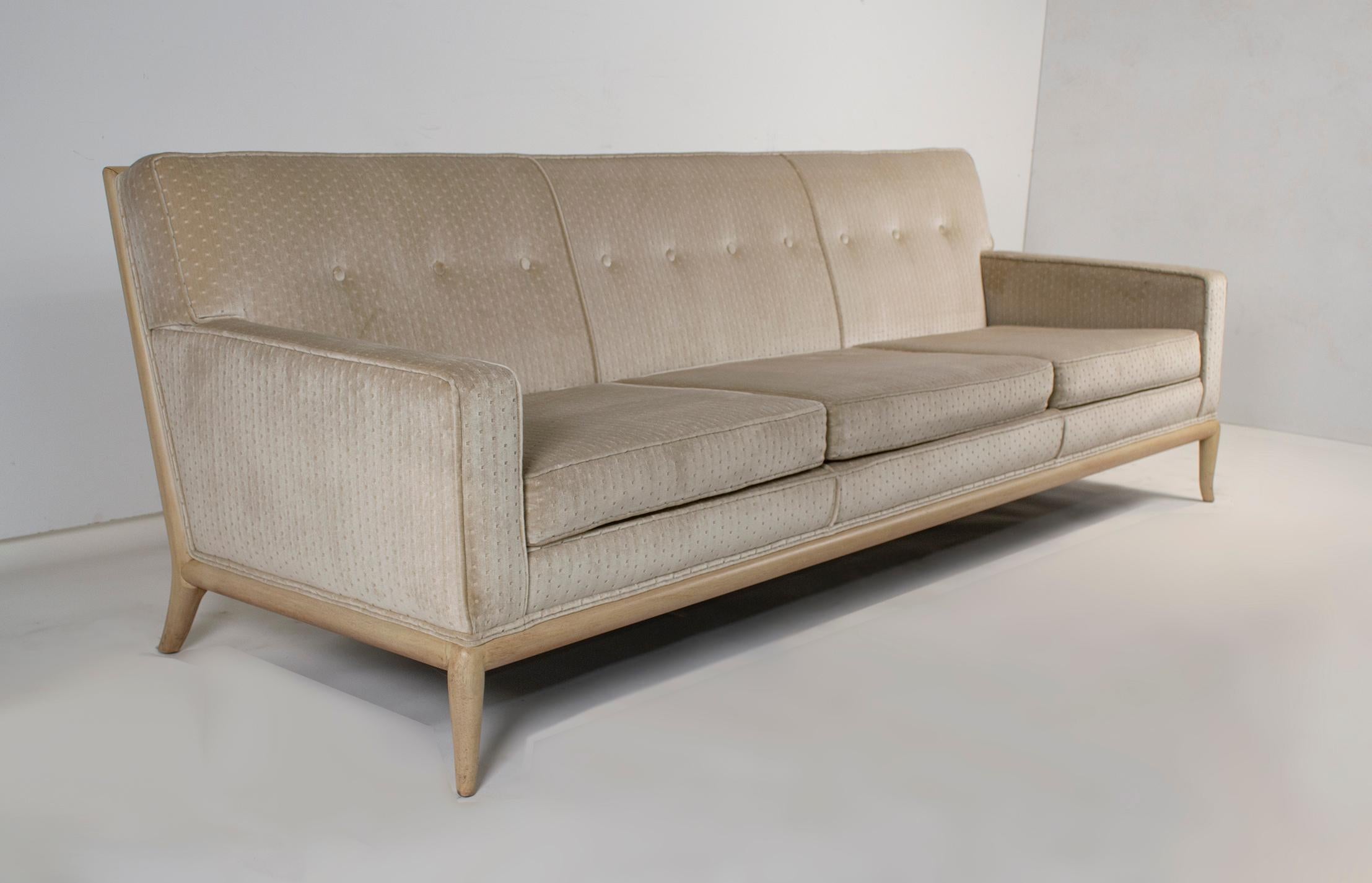 Unique Robsjohn Gibbings sofa upholstered in a soft Chenille textile with a custom ordered bleached walnut frame. This sofa is very comfortable as it has an 8-way hand-tied spring system tucked into the frame. Constructed with solid hardwoods this