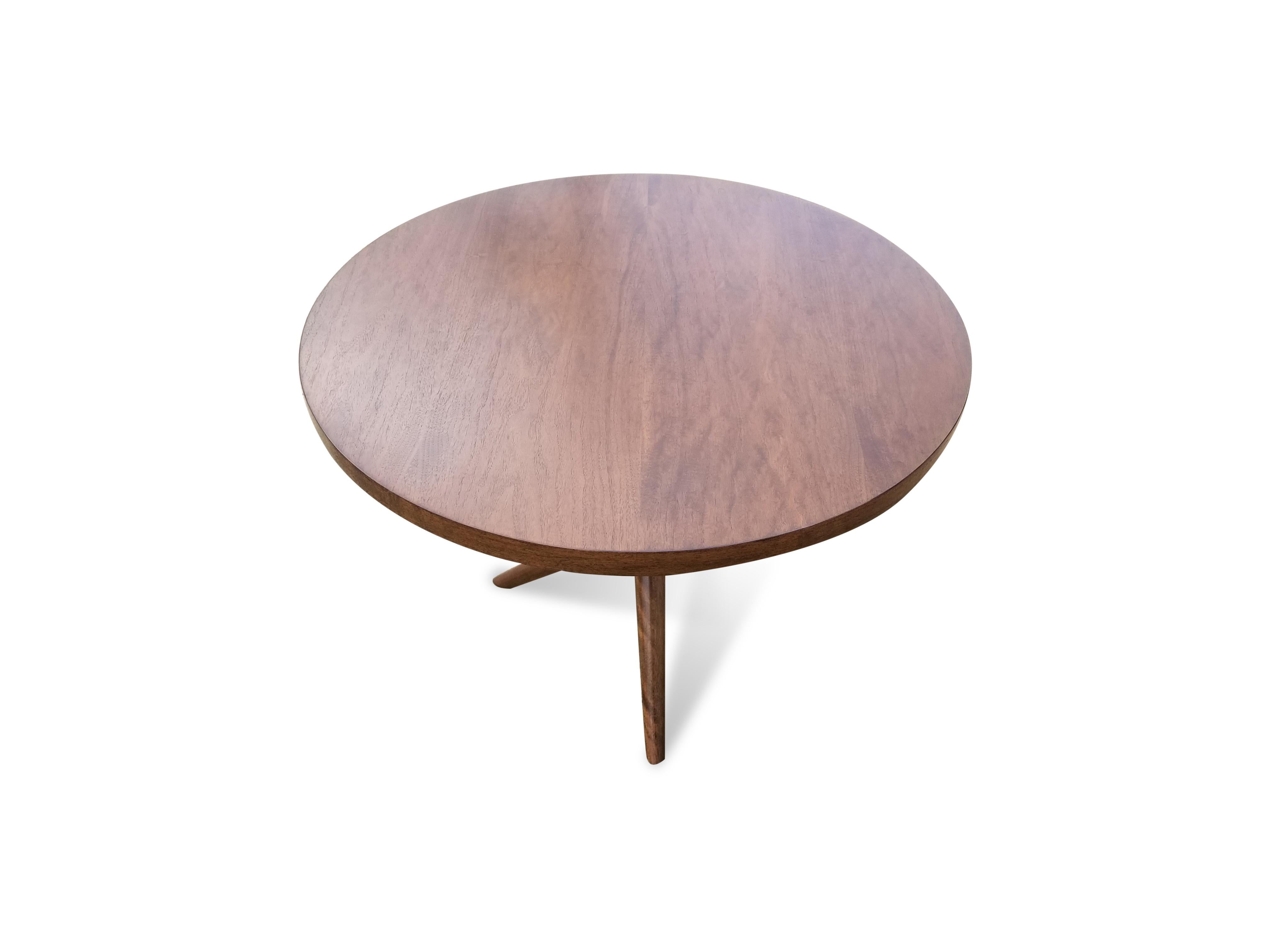 T.H. Robsjohn-Gibbings tripod base side table.