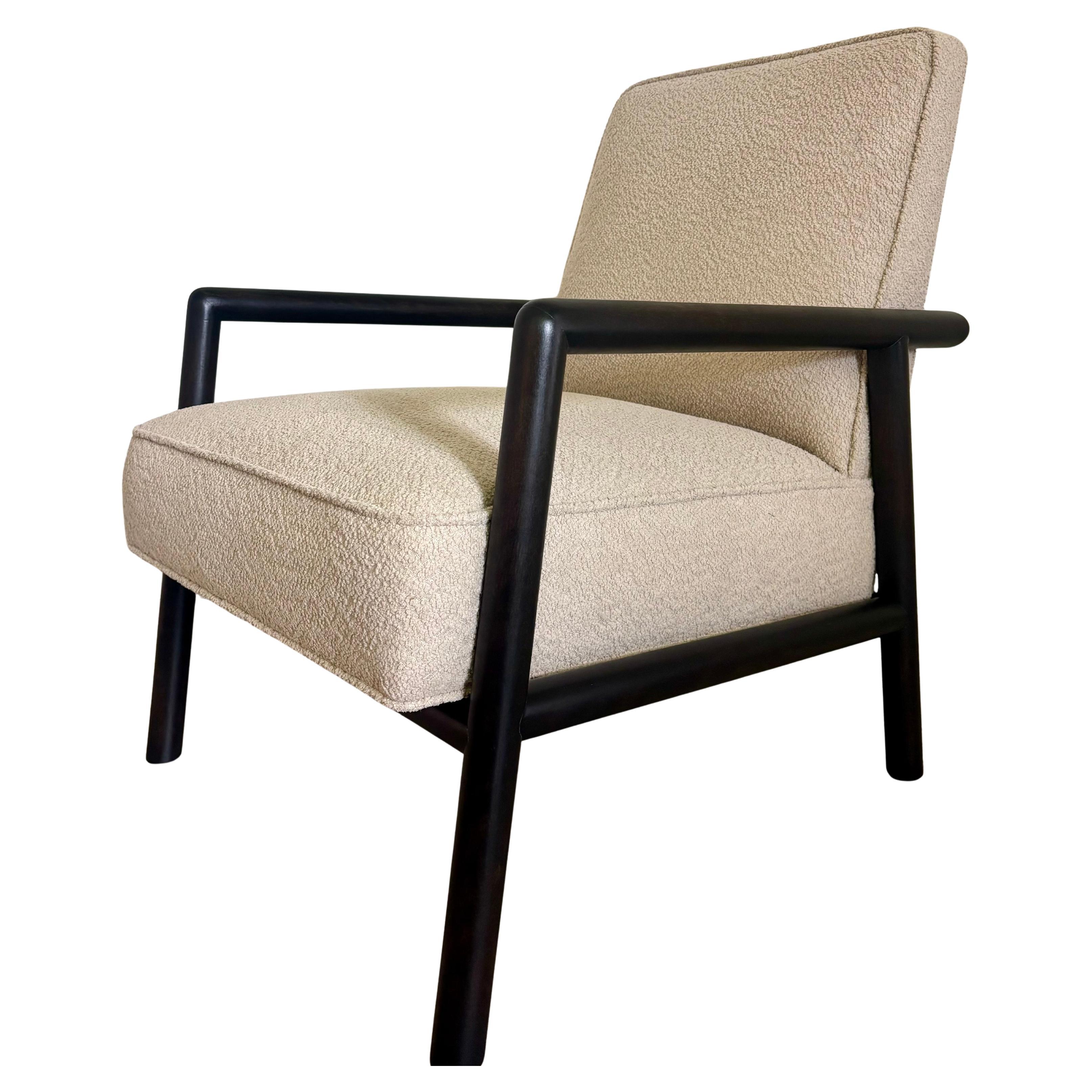 An exceptional and rare lounge chair designed by T.H. Robsjohn Gibbings. 

Fully refinished and reupholstered. A structure of beautiful solid round dowel shaped wood arranged with interesting angles that it will catch your eye from anywhere in the