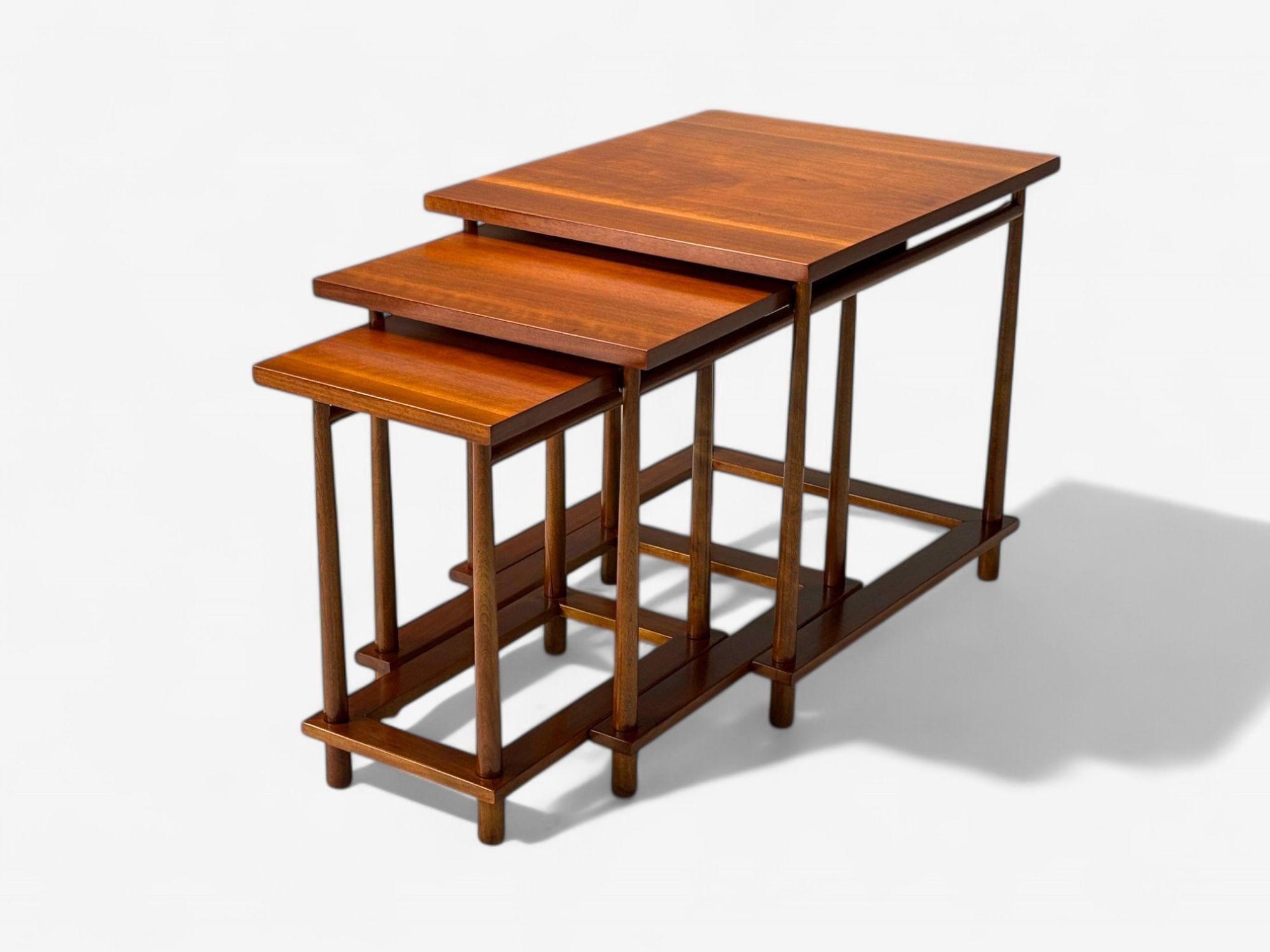 T.H. Robsjohn-Gibbings, Widdicomb, Mid-Century Modern, Three Interlocking Nesting Tables, Side or End Tables, USA, 1950s

A set of three nesting tables designed by T.H. Robsjohn-Gibbings for Widdicomb, circa 1950s. The tables are crafted from
