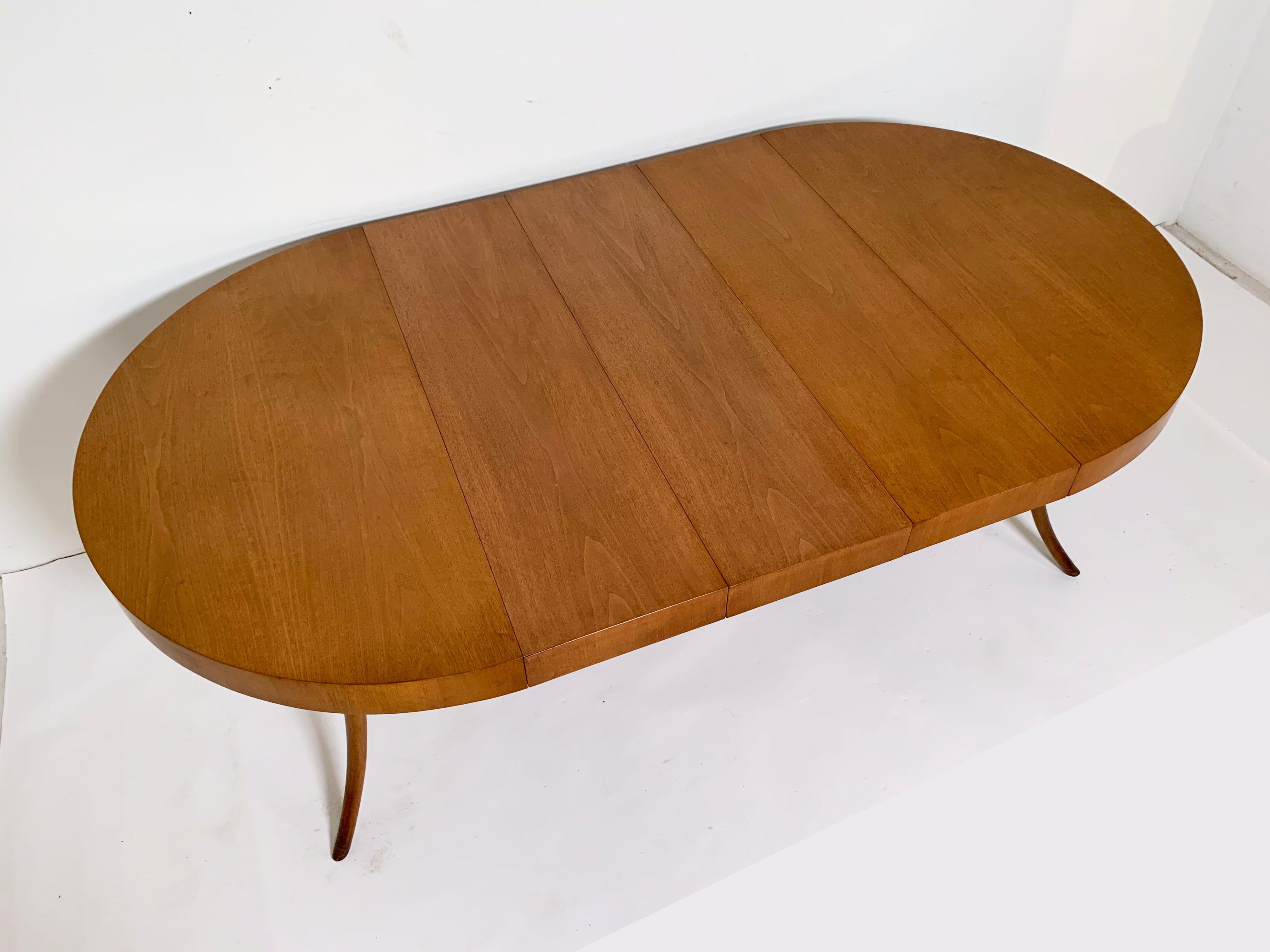 Mid-20th Century T.H. Robsjohn-Gibbings Widdicomb Saber Leg Round Dining Table with Three Leaves