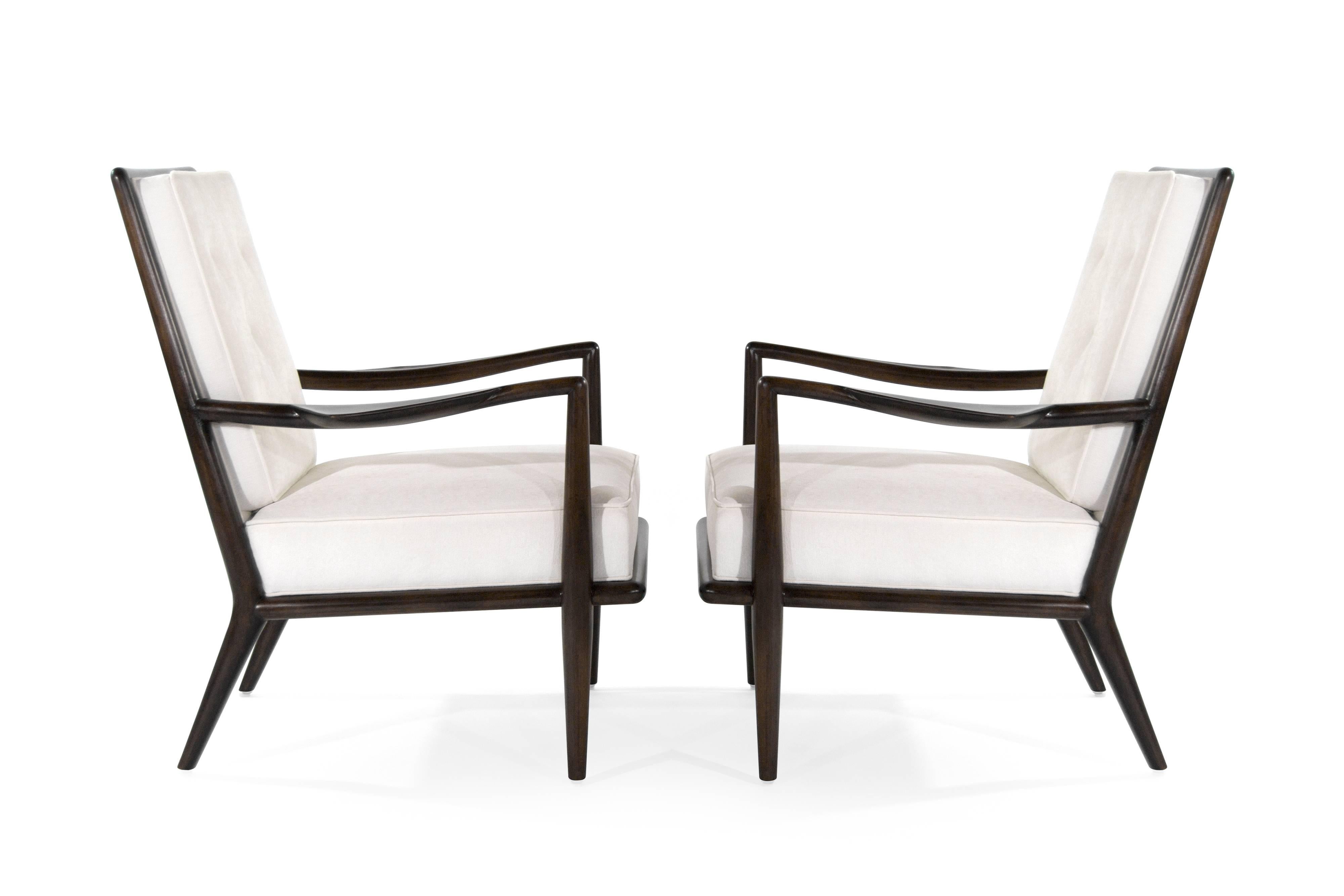 Extremely rare set of lounge chairs designed by T.H. Robsjohn-Gibbings for Widdicomb, circa 1950s.

Walnut frames fully restored, newly upholstered.