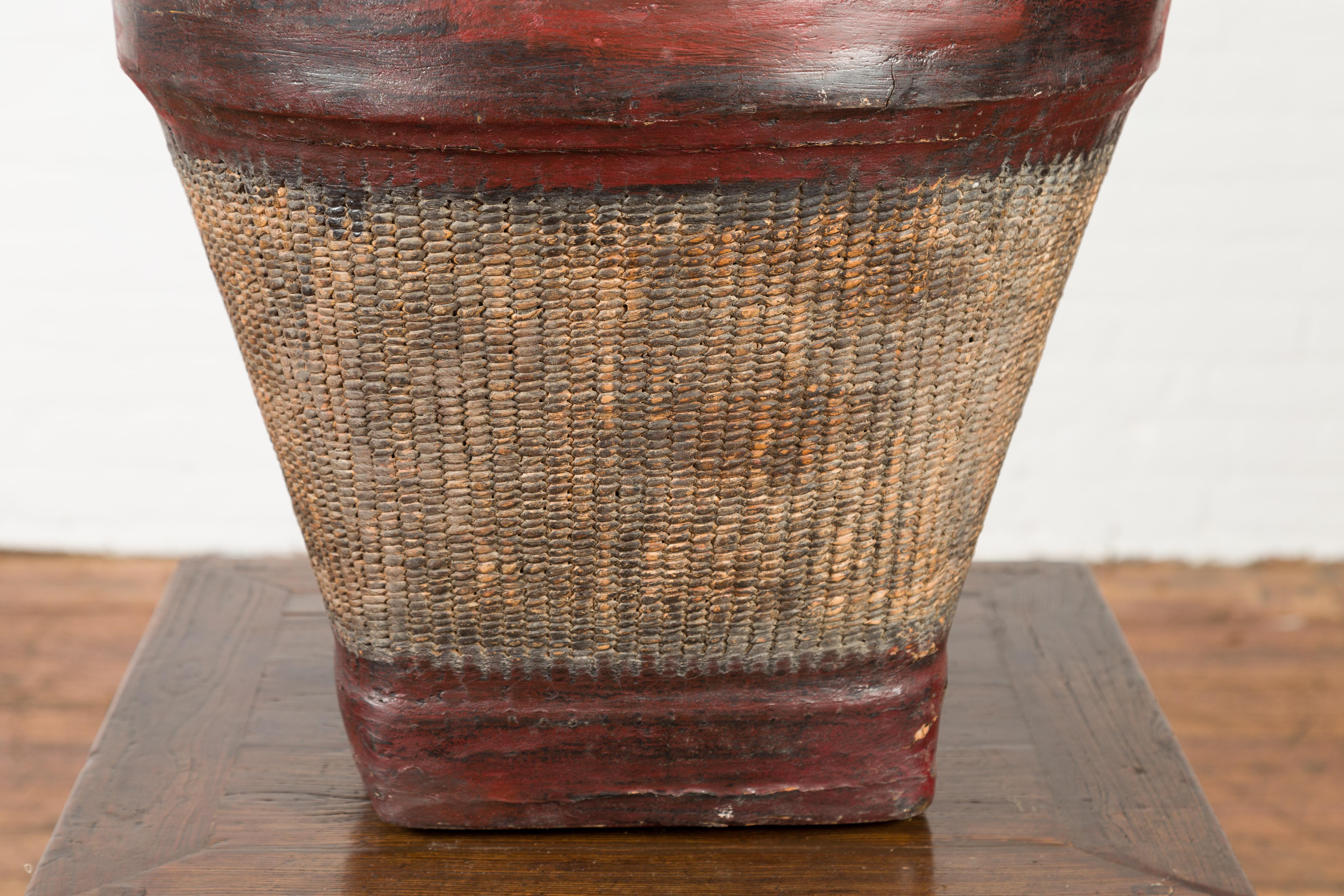Lacquered Thai 19th Century Rustic Hand-Woven Rattan Rice Basket with Red Rim For Sale