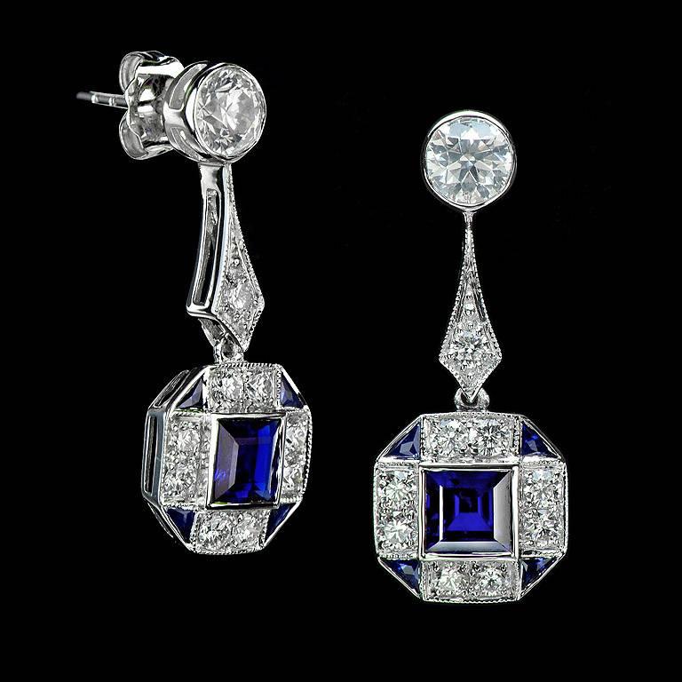 Step Cut Thai Blue Sapphire 2.21 Carat set on 18K White Gold Earrings with a Pair of Diamond 1.12 Carat and another 0.88 Carat small Diamonds surrounded.

Earrings with Butterfly stud