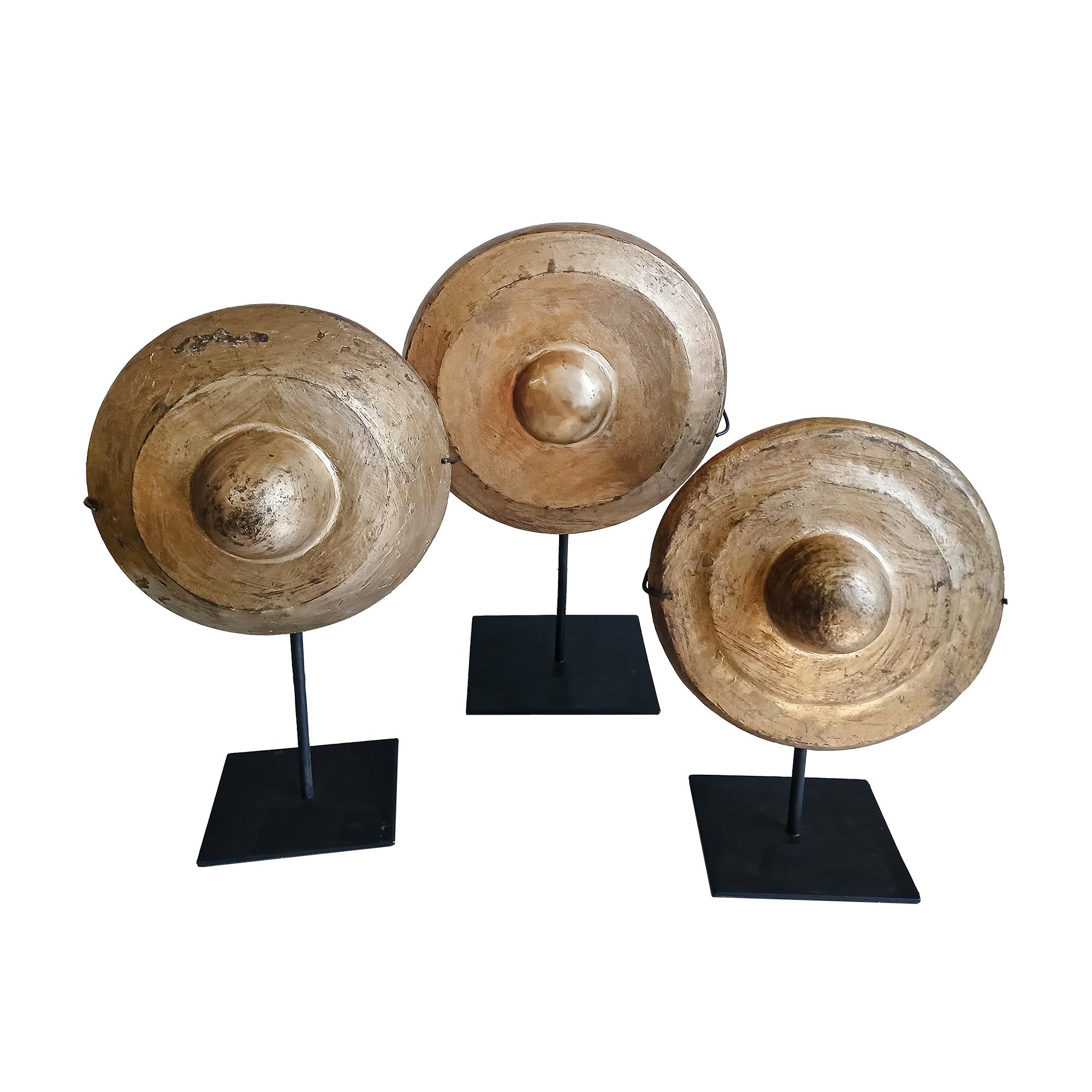 Three vintage brass gongs, finished in gilt on the outside and black / red lacquer on the inside. Thailand, early 20th Century. 

Mounted on bespoke metal stands. 

Dimensions below are for the tallest piece, at 15.5 inches high (mounted). All other