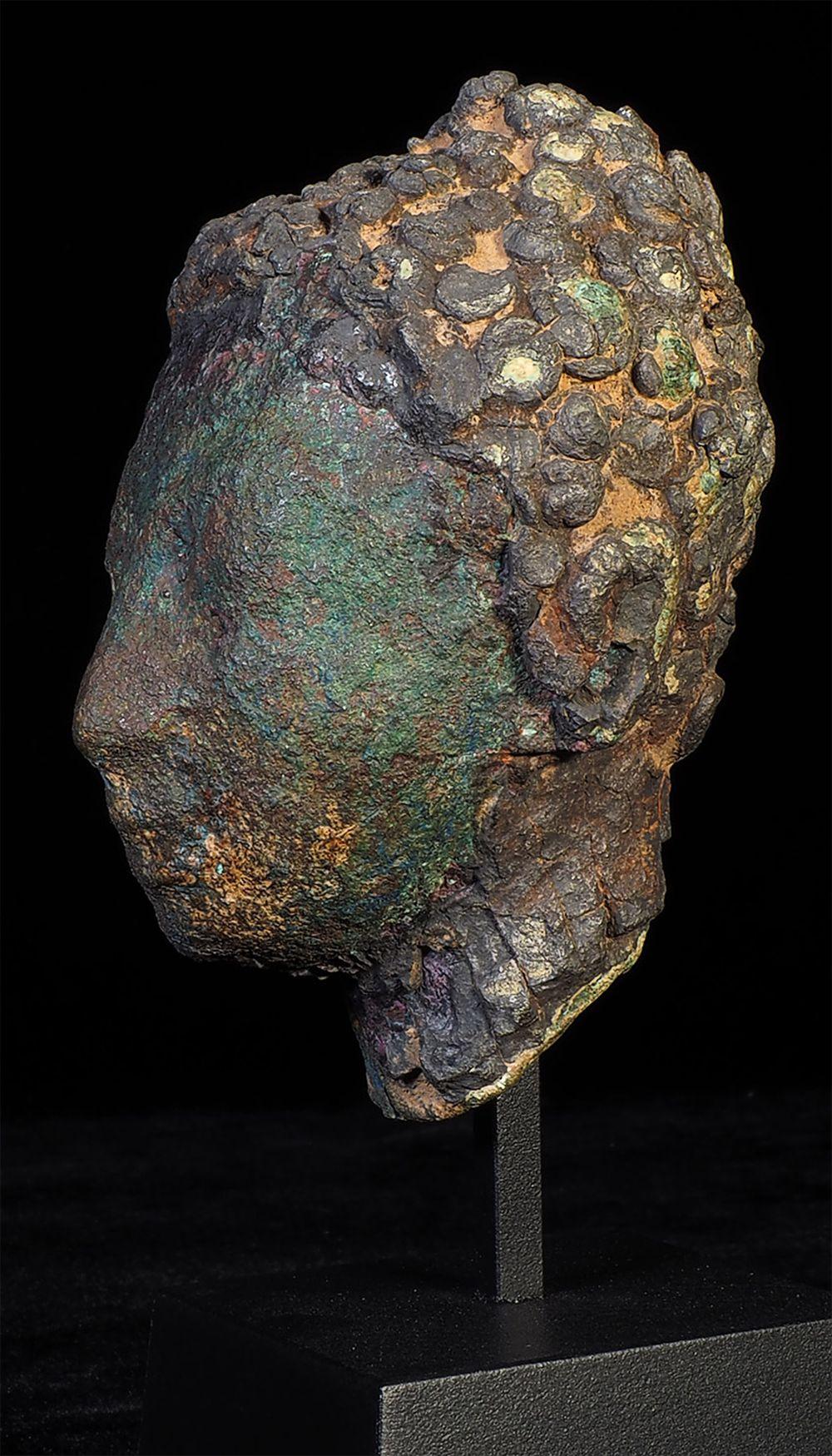 Very early Thai bronze Buddha head from the 9th/10thC. It has a sensitivity and finesse not often found in such early SE Asian sculptures. It is very large for a bronze head from this early period and quite heavy. The Buddha was probably standing