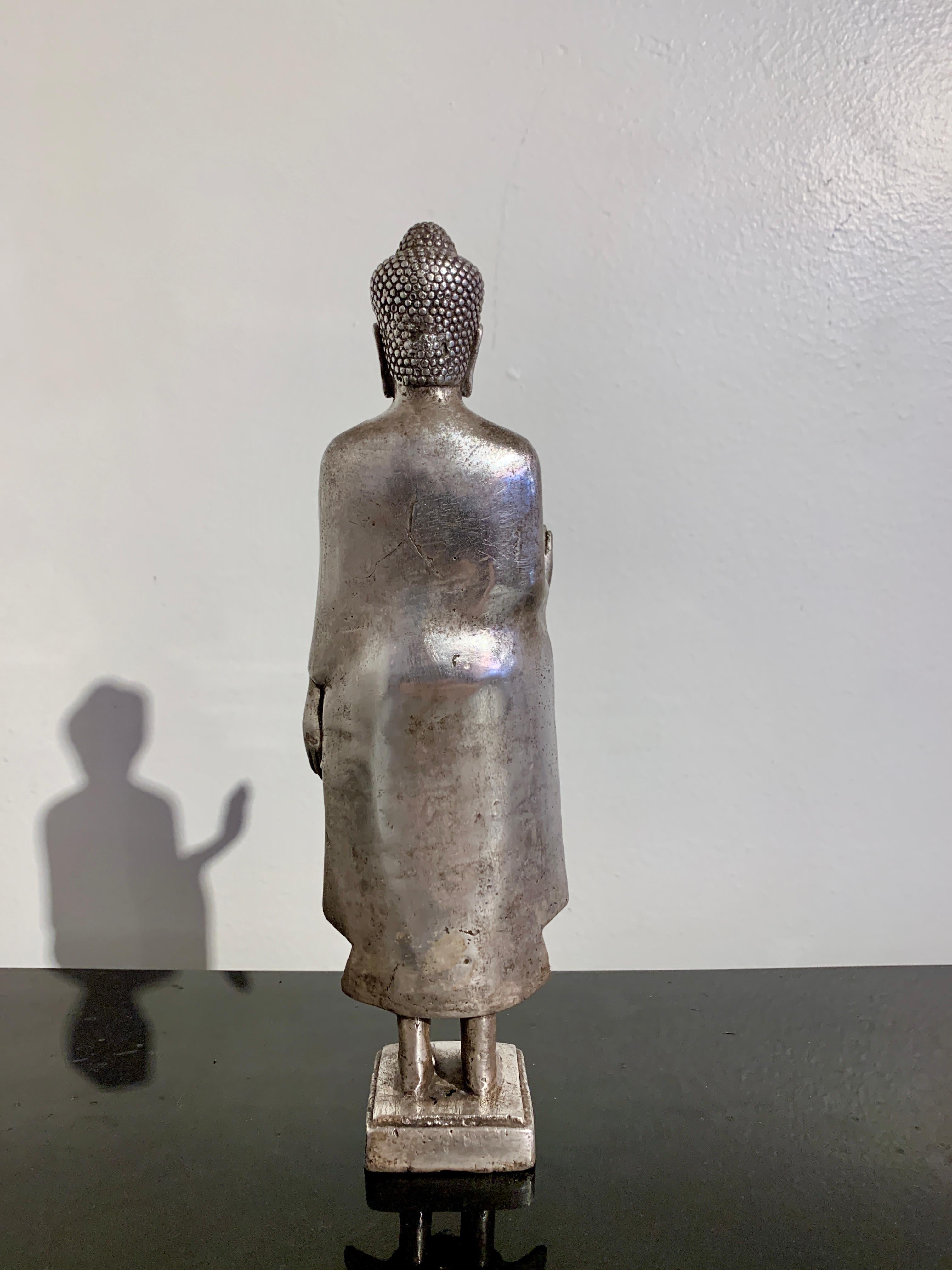 Thai Cast Silver Alloy Standing Buddha, Mid 20th Century, Thailand In Good Condition For Sale In Austin, TX