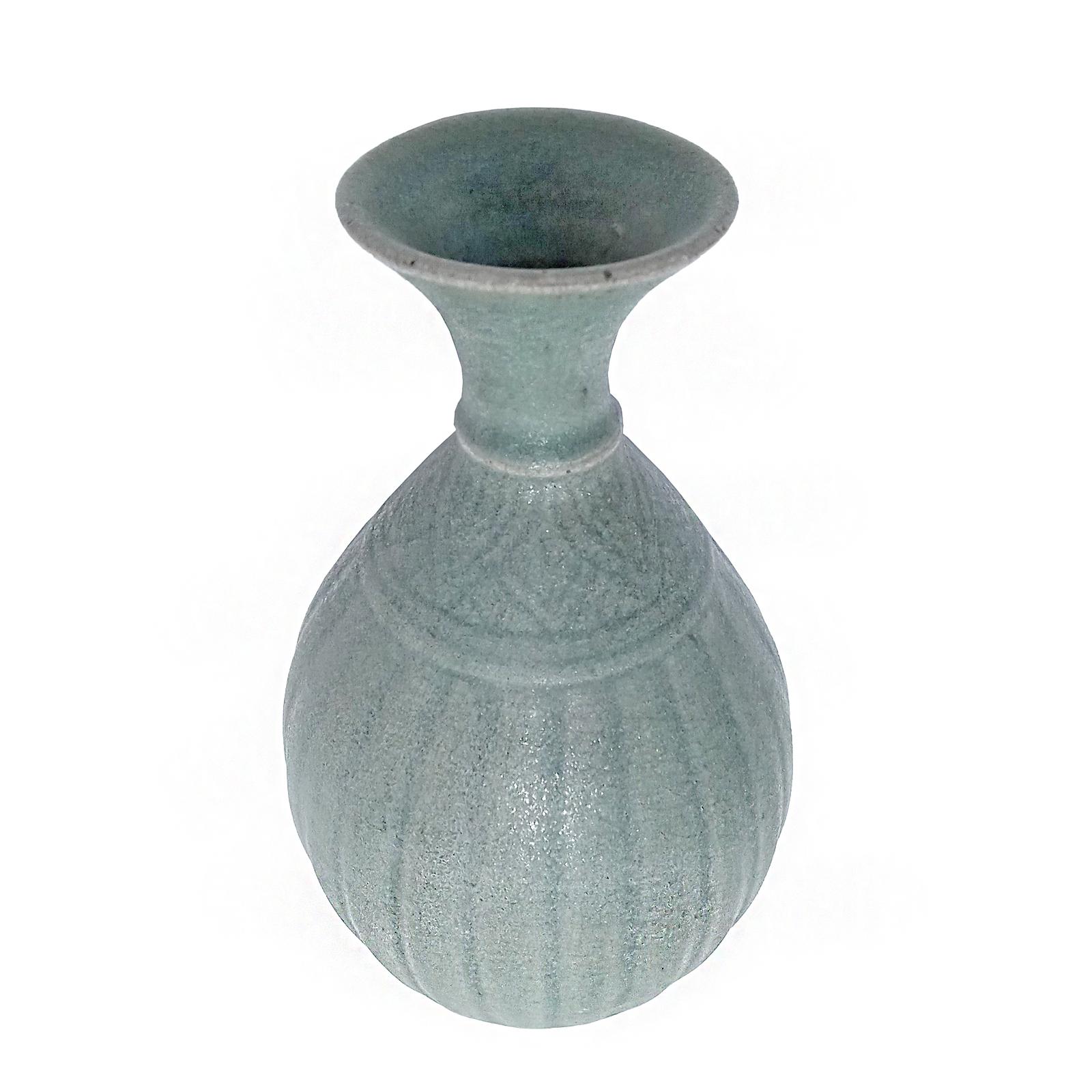 A beautiful Celadon vase from Thailand, late 19th Century. 

While the golden age of Thai ceramics ended around the 15-16th Centuries, Thai artisans transmitted the craft through generations, later producing smaller numbers of pieces with different