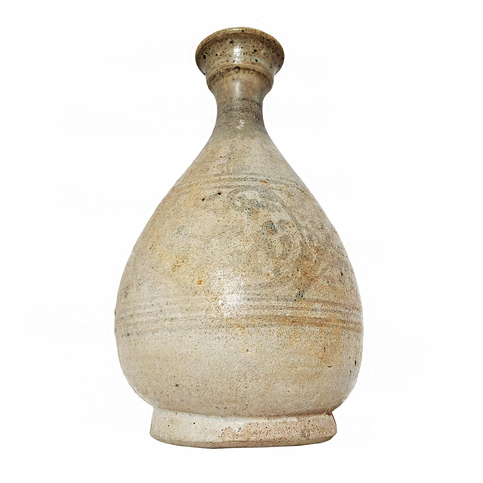 A ceramic vase from Thailand, with light cream glaze and painted floral decorations. Late 19th Century. 

While the golden age of Thai ceramics ended around the 15-16th Centuries, Thai craftsmen learned the art through generations, later producing