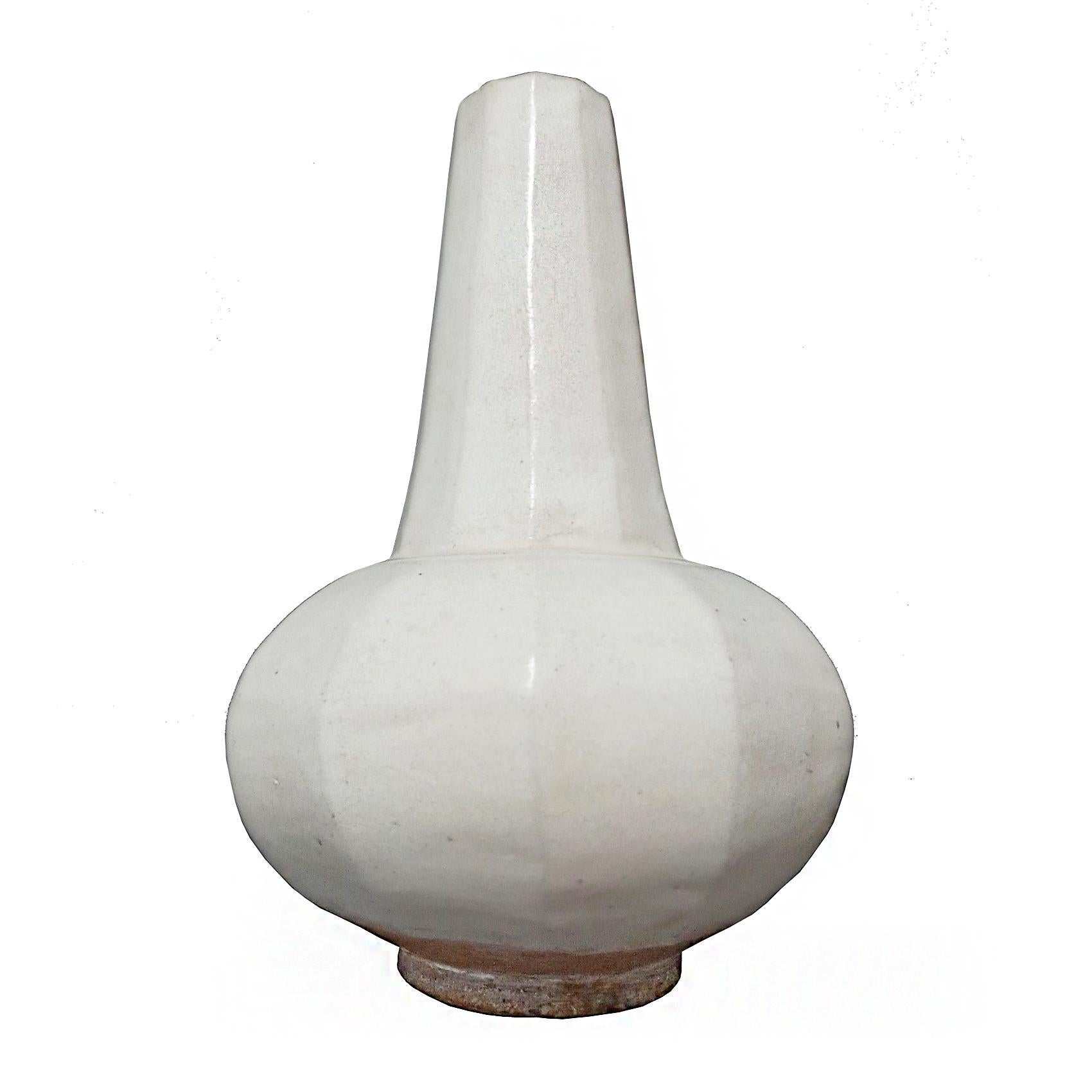 A ceramic vase from Thailand, with off-white glaze. Contemporary. 

While the golden age of Thai ceramics ended around the 15-16th Centuries, local craftsmen learned the art through generations, later producing a smaller number of pieces with