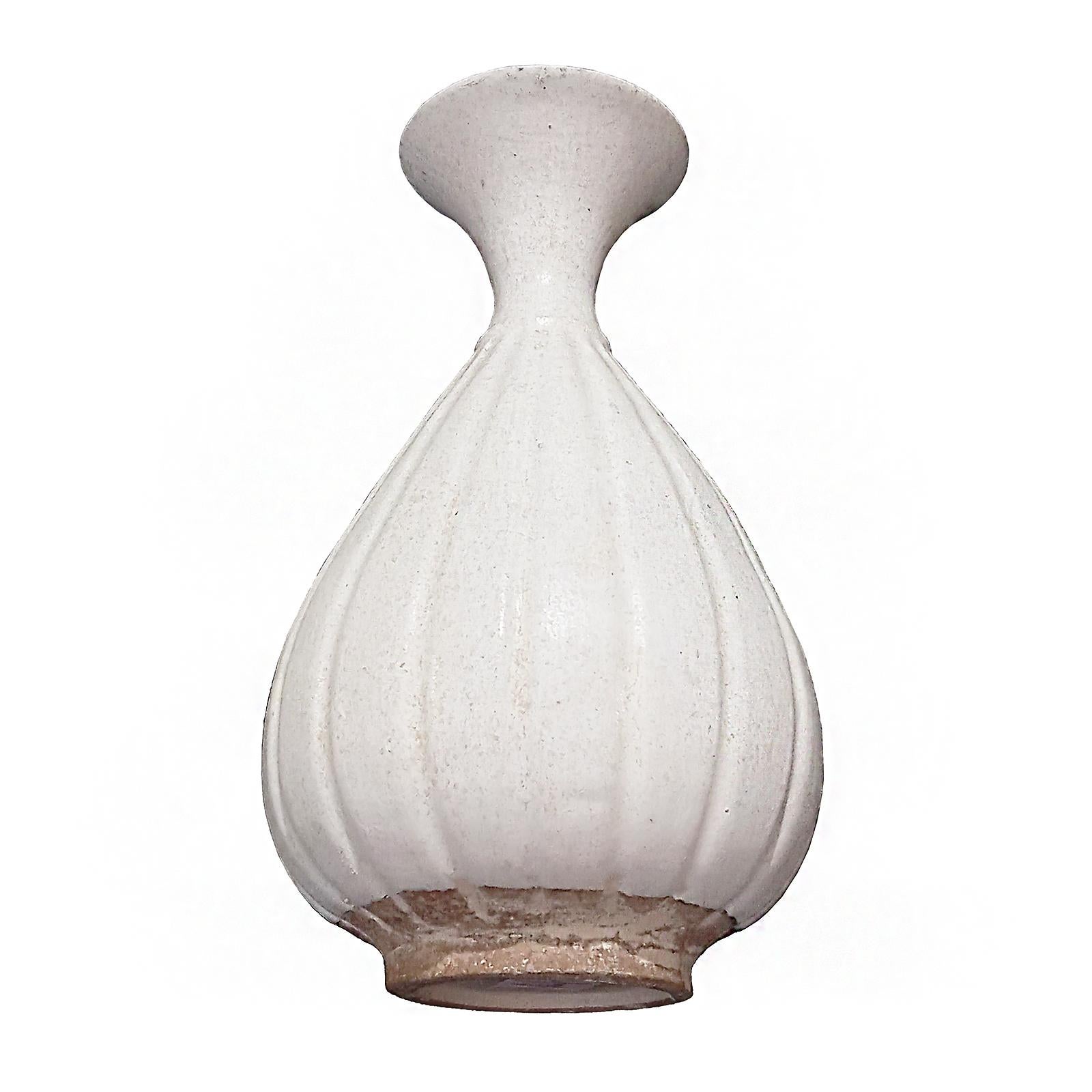 A ceramic vase from Thailand, with white glaze. Contemporary. 

While the golden age of Thai ceramics ended around the 15-16th Centuries, local craftsmen learned the art through generations, later producing smaller numbers of pieces with different