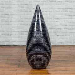 Sleek Black and White Glazed Ceramic Vase with Striated Décor, Narrow Mouth