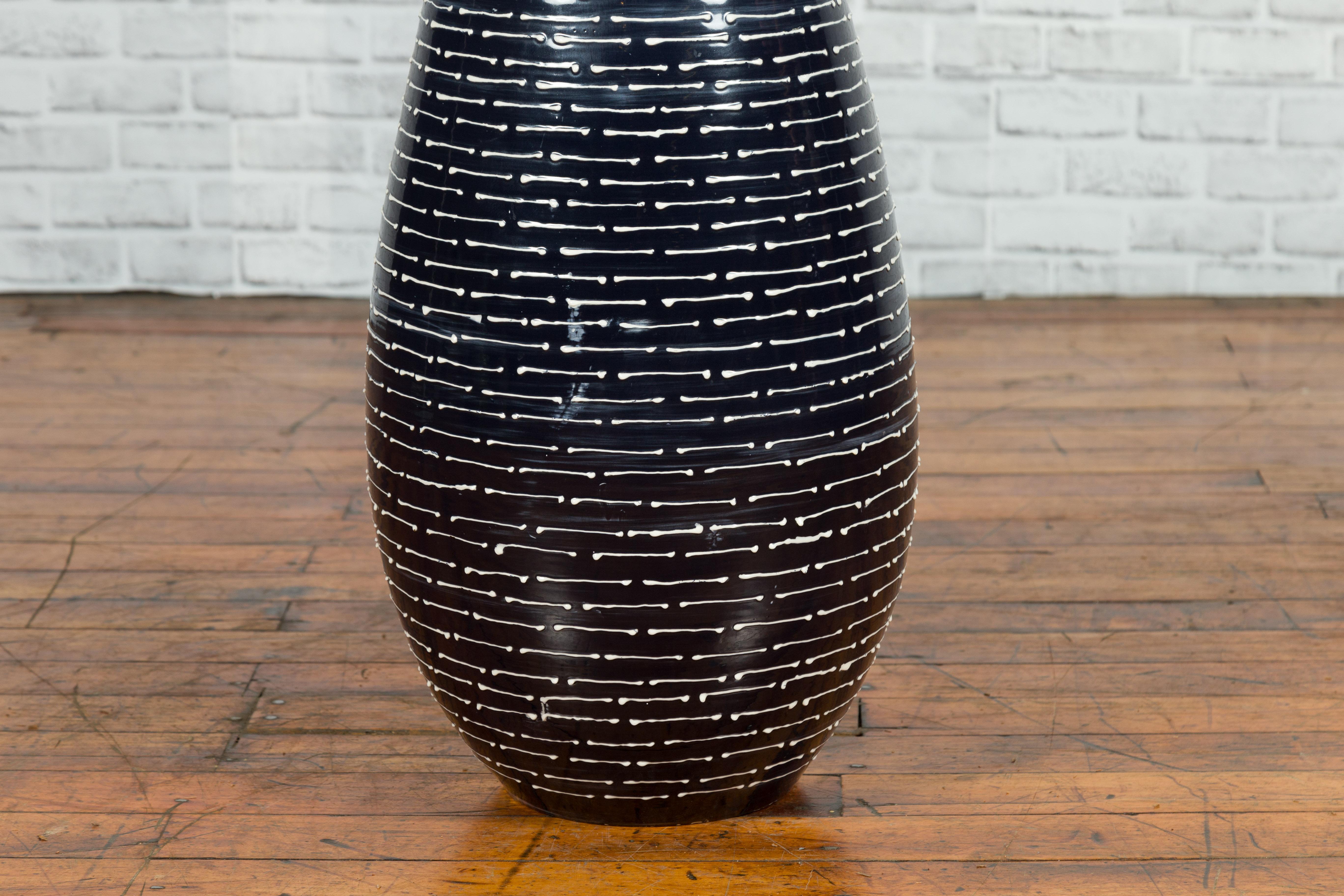 Sleek Black and White Glazed Ceramic Vase with Striated Décor, Narrow Mouth For Sale 2