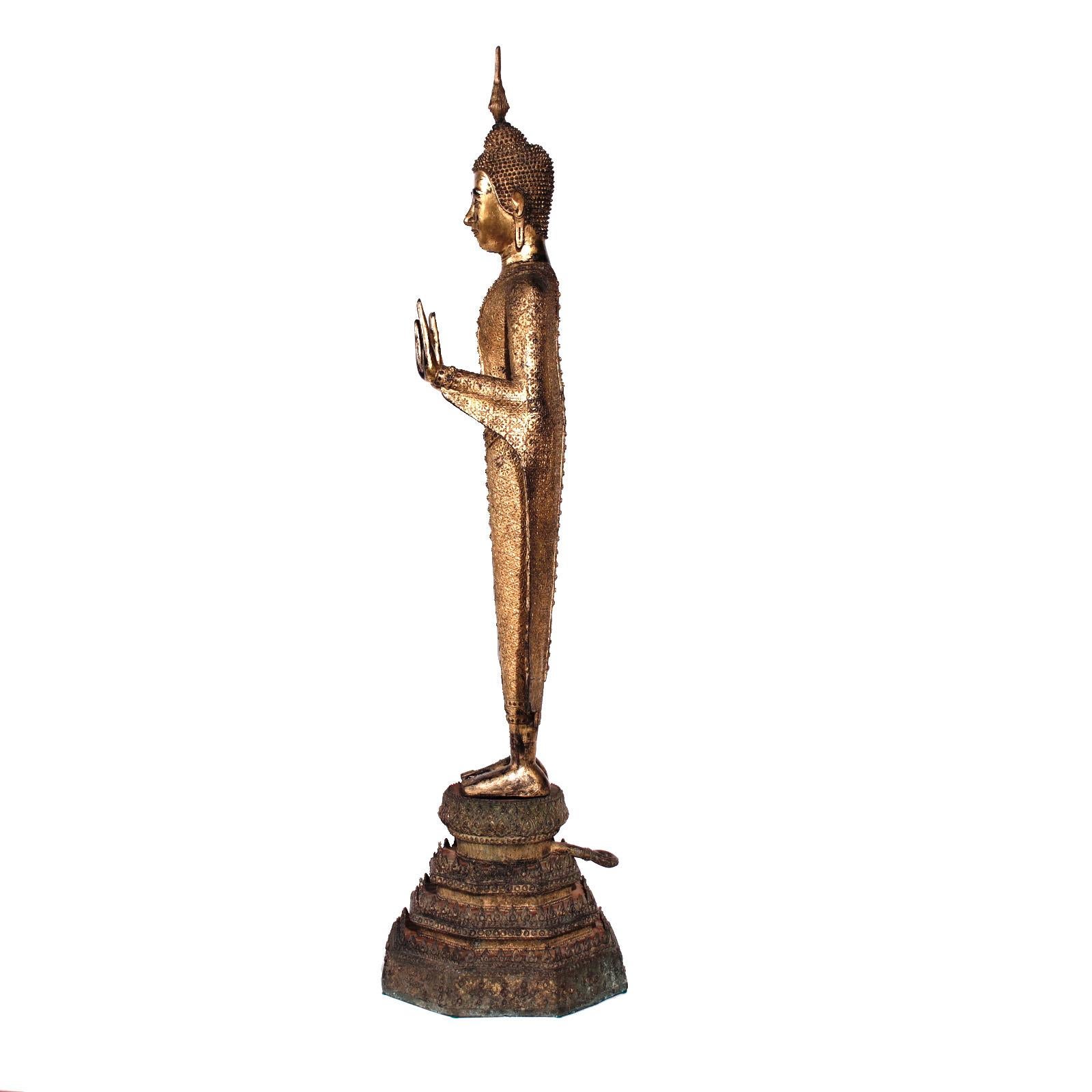 Thai Gilt Bronze Standing Buddha Figure, Late 19th Century In Good Condition For Sale In New York, NY