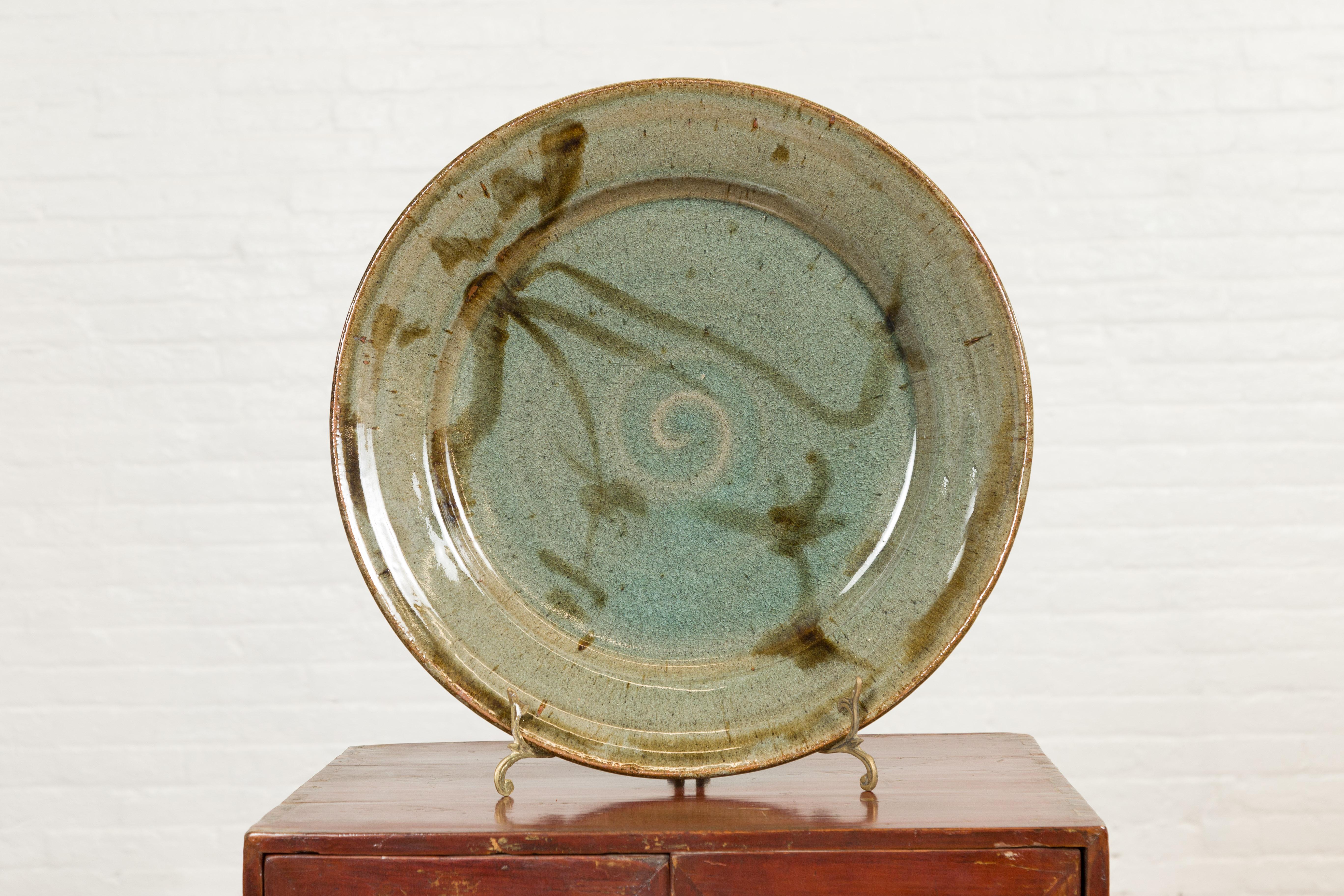 Hand-Thrown Ceramic Charger Plate with Green and Brown Spiral Painted Decor For Sale 2