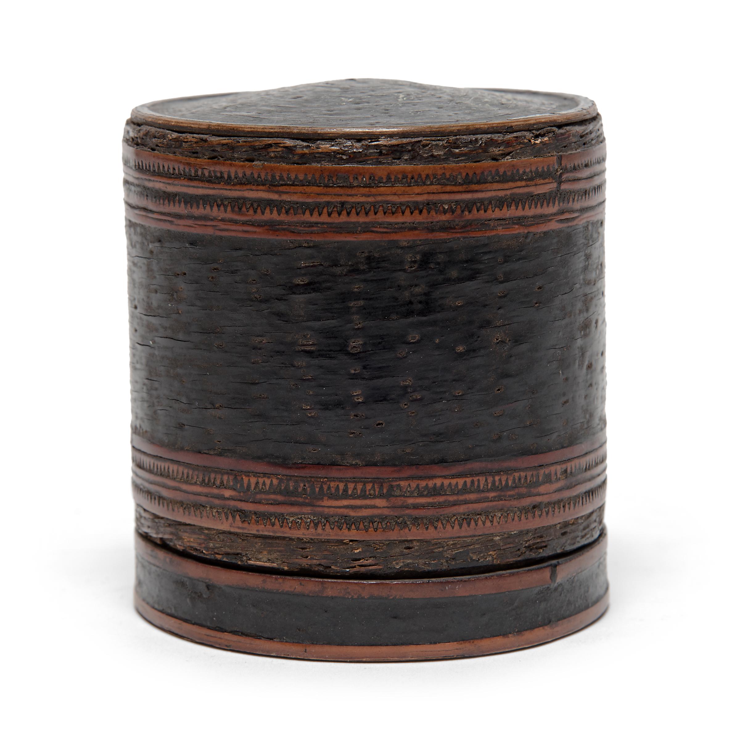 In many Southeast Asian cultures, offering guests a betel quid to chew was the fundamental symbol of hospitality. A blend of leaves, nuts, seasonings, and sometimes tobacco, betel was kept in finely worked and decorated boxes. This round betel box