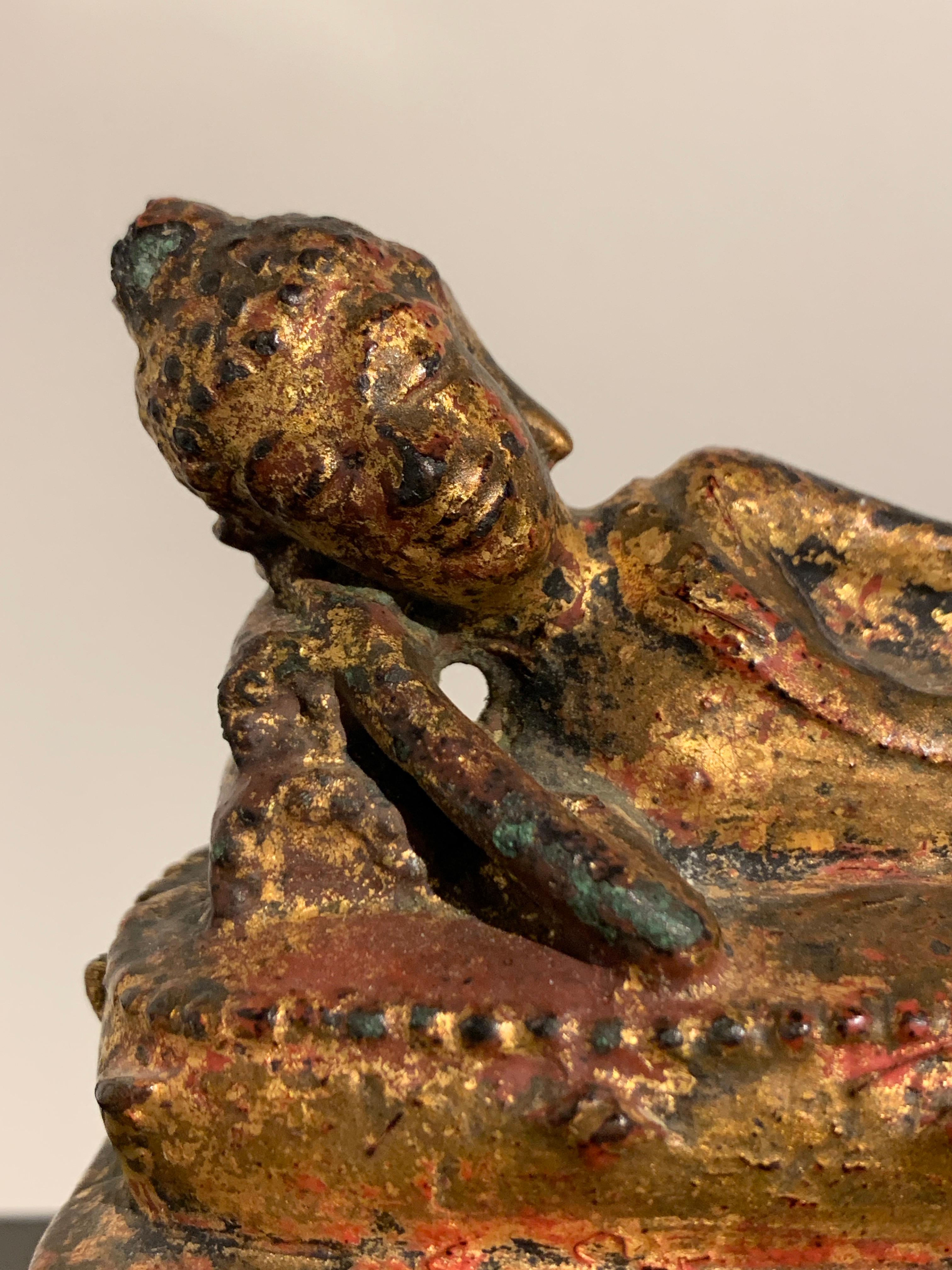 Cast Thai Lanna Gilt Bronze Reclining Buddha, 16th Century, Northern Thailand