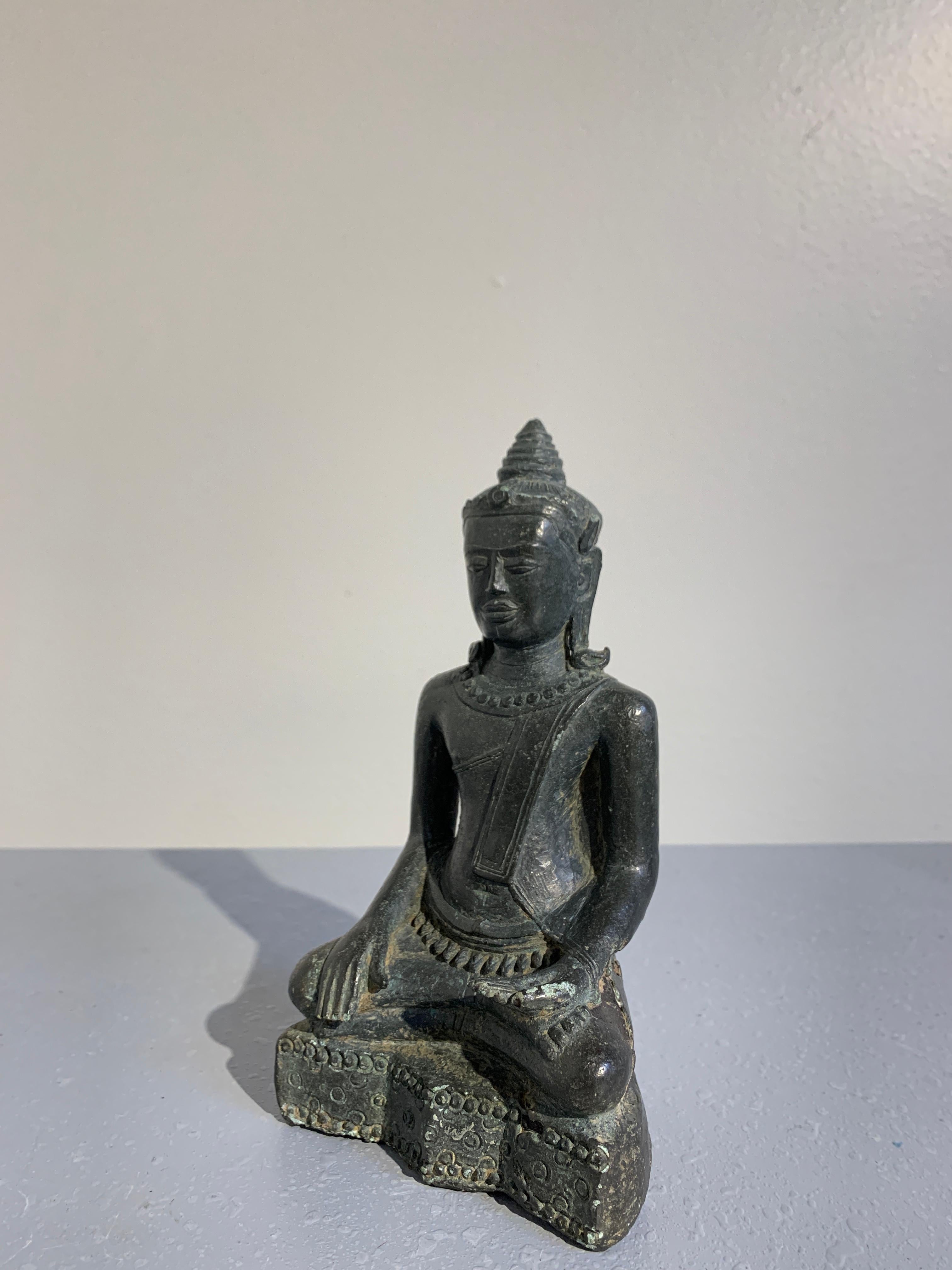 Thai Lopburi Cast Bronze Seated Buddha, 13th Century In Fair Condition For Sale In Austin, TX