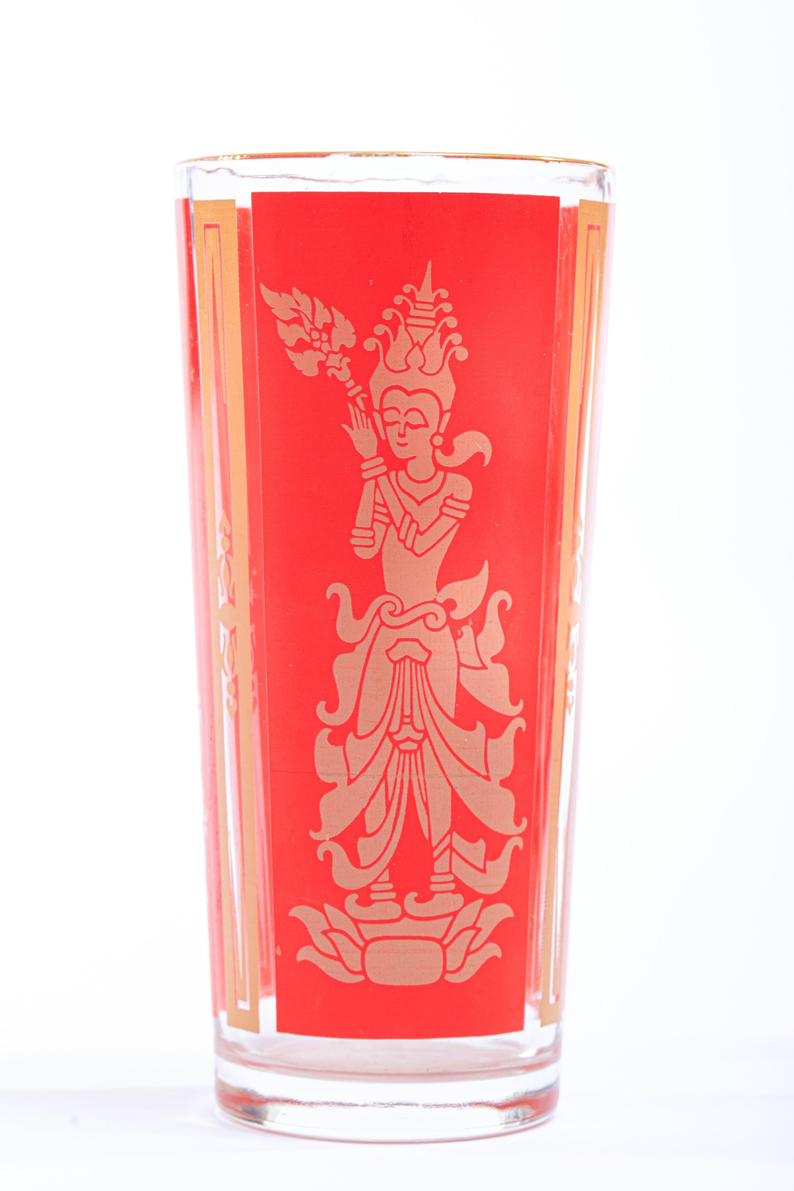 Vintage and chic with gold rims, these Thai Princess cocktail tumblers are in excellent original condition and feature a Thai Princess in beige set against a traditional Chinese red backdrop. Perfect accent to Asian or chinoiserie decor set atop an