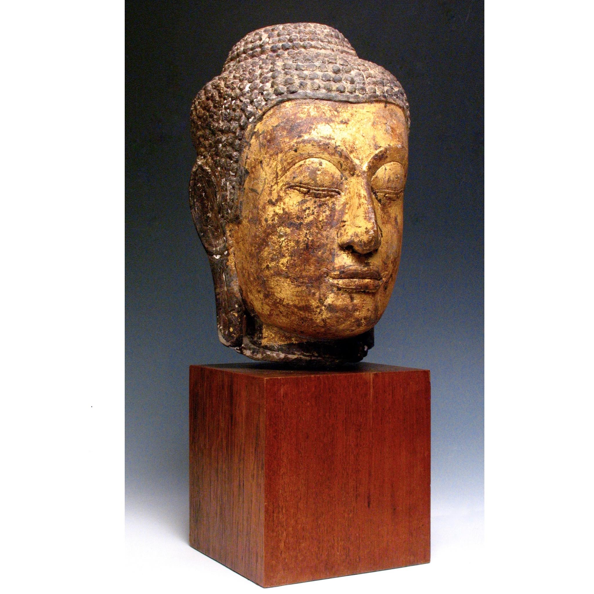Hand-Carved Thai Sandstone Carving of the Head of A Buddha Image For Sale