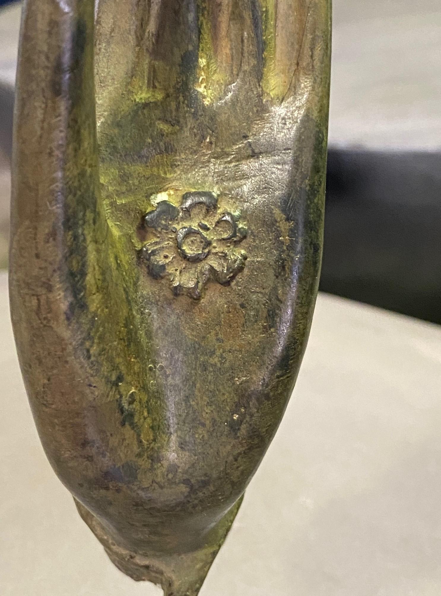 20th Century Thai Siamese Asian Bronze Buddha Hand Fragment Vitarka Mudra on Wood Stand