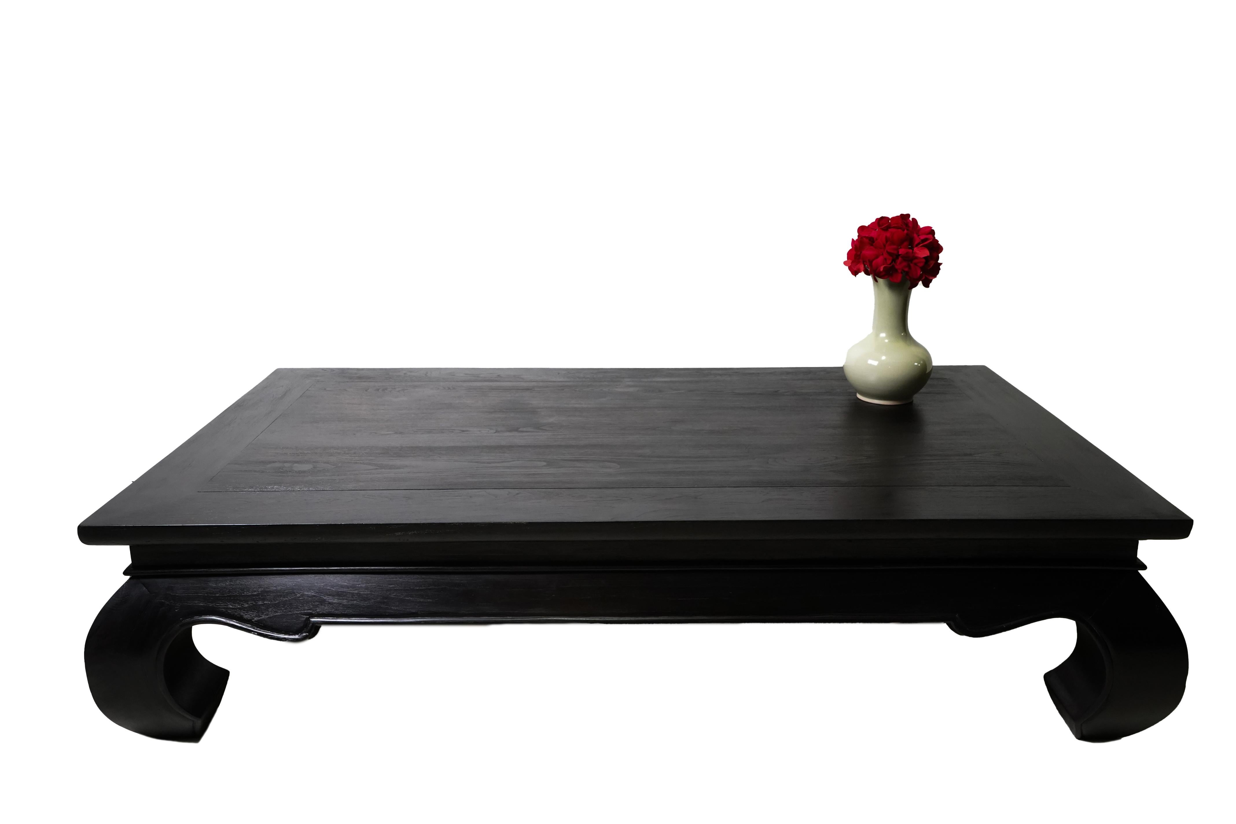 A powerfully built large, rectangular Lan Na Thai coffee table with curved 