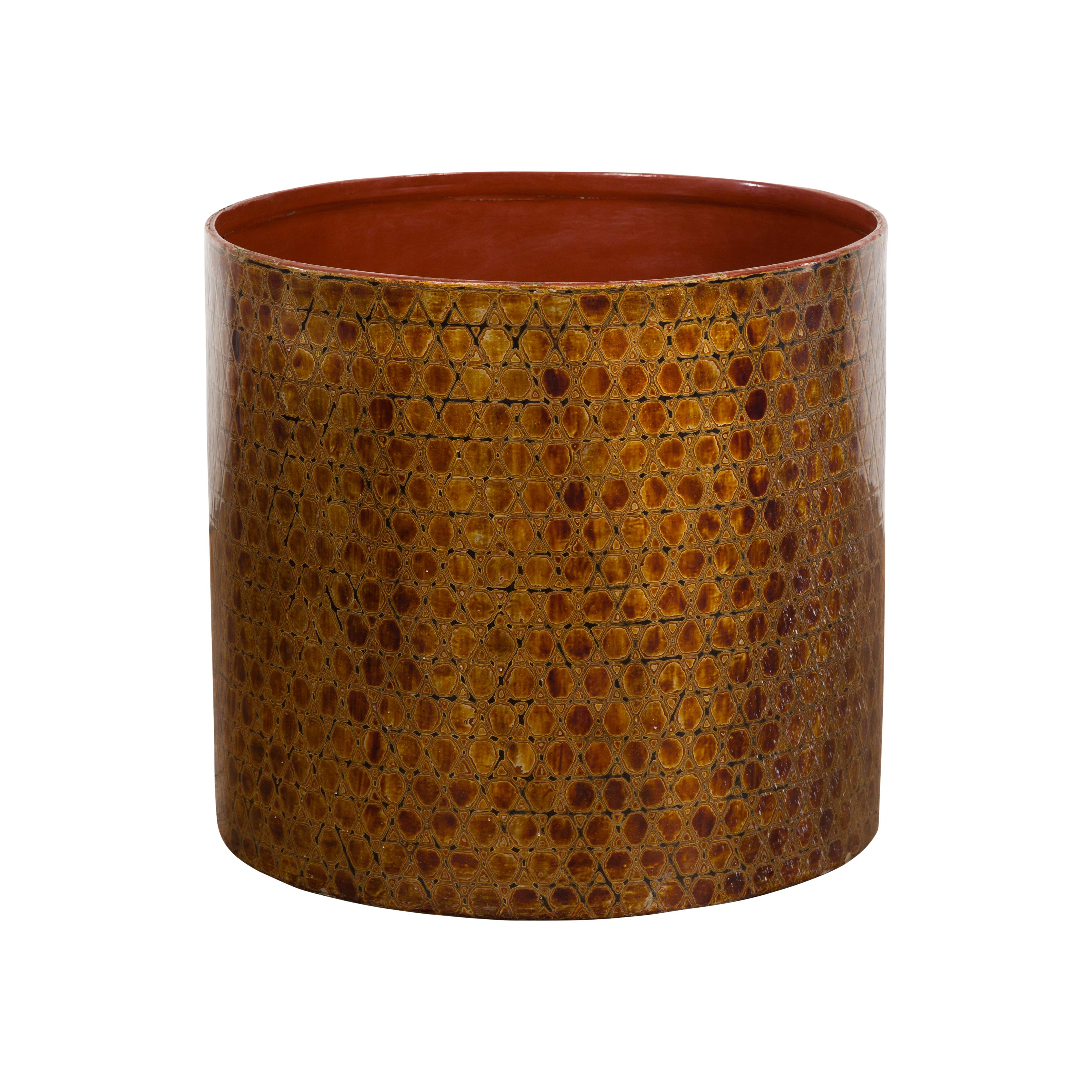 A Round Vintage Lacquered Storage Bin from the mid-20th century with snake skin patterns. Introduce a touch of exotic elegance to your space with this vintage Thai Negora lacquer storage bin from the mid-20th century. Crafted with meticulous
