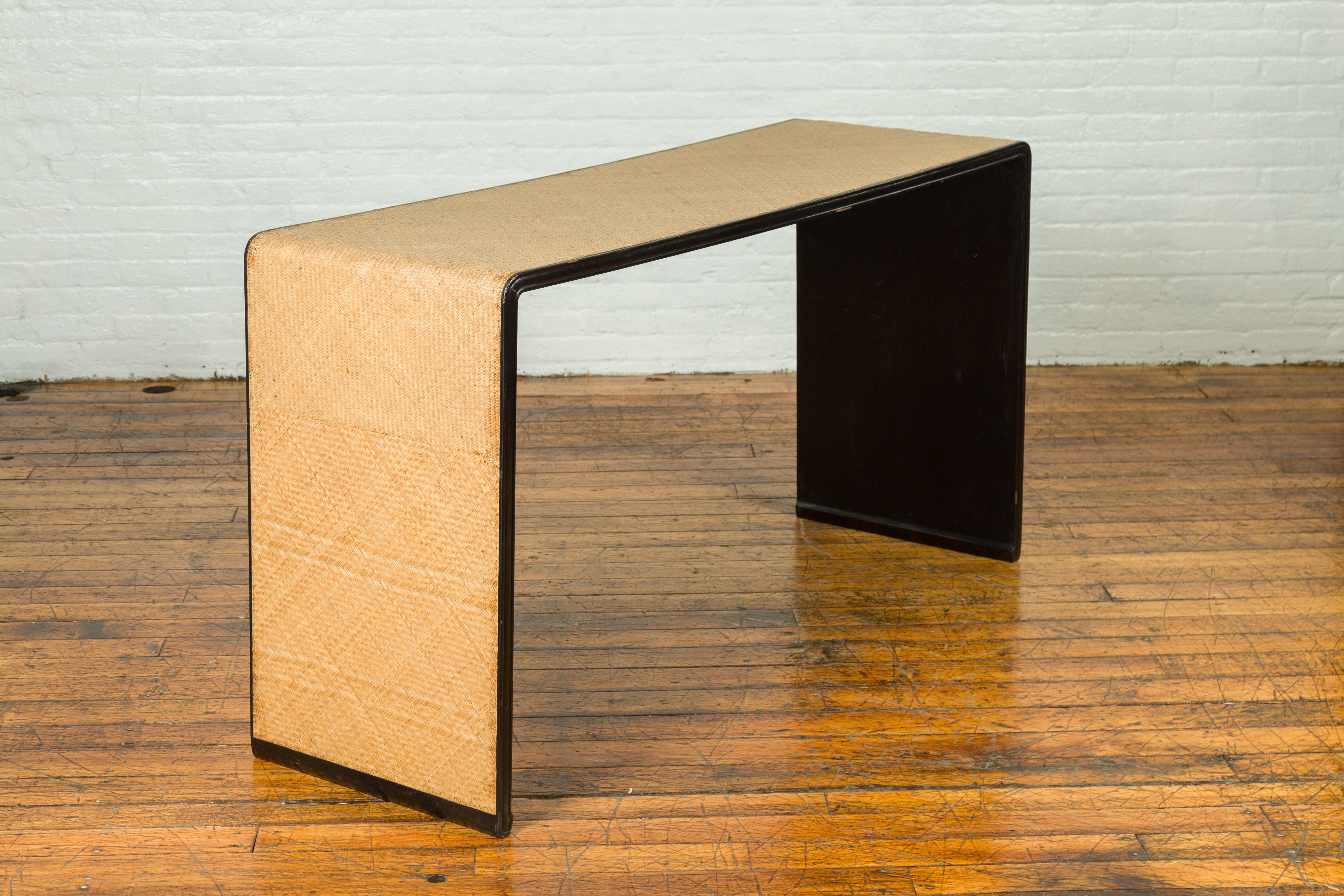 black waterfall console table