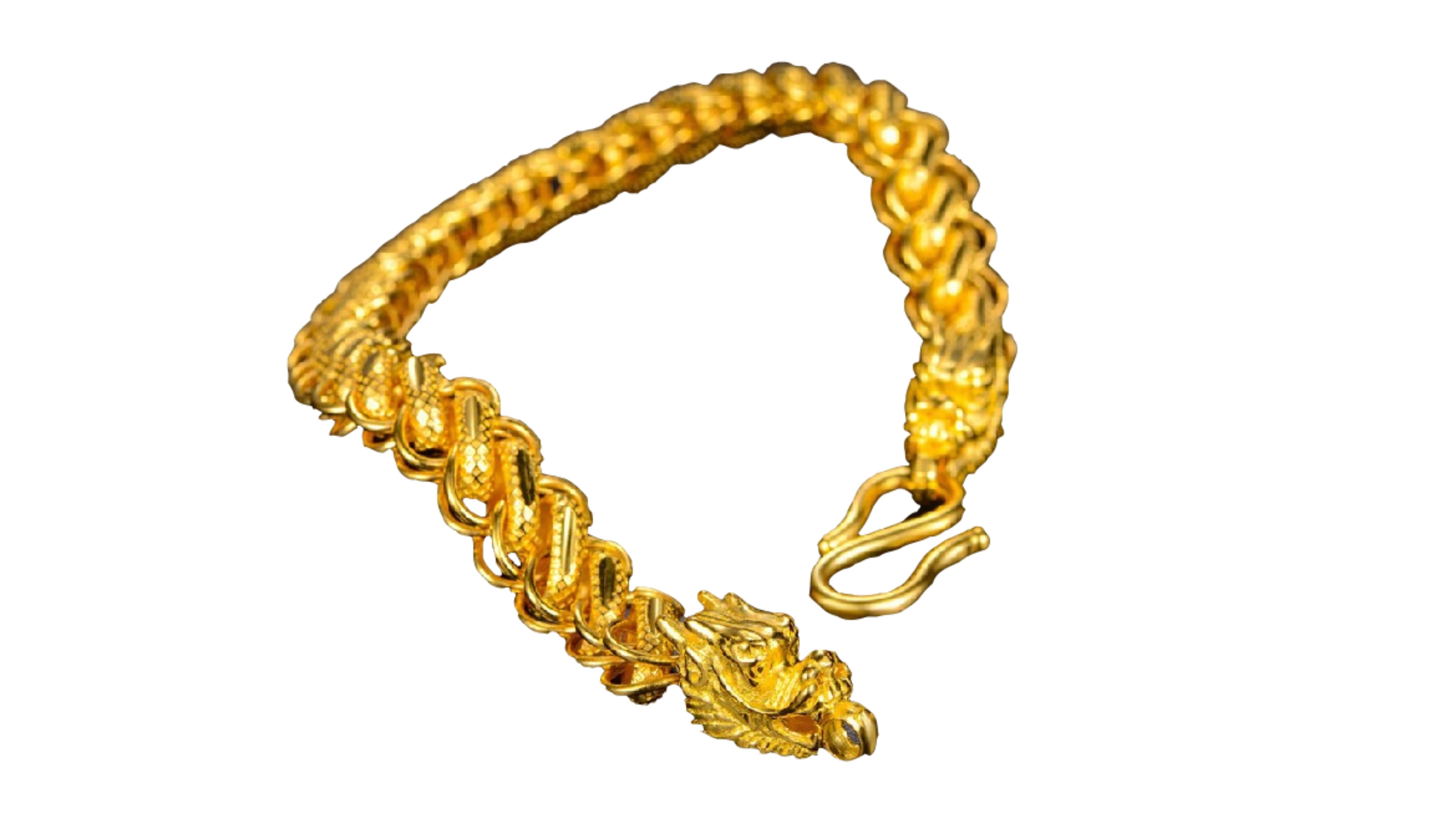 Thailand Dragon Mens Bracelets24 Karat Yellow Gold  

This is a Thailand Dragon Mens Bracelet set in 24k Yellow Gold stands out and adds to our collection for dragon jewellery such as rings.   
   
The meaning  for Dragons in Thailand, similar to