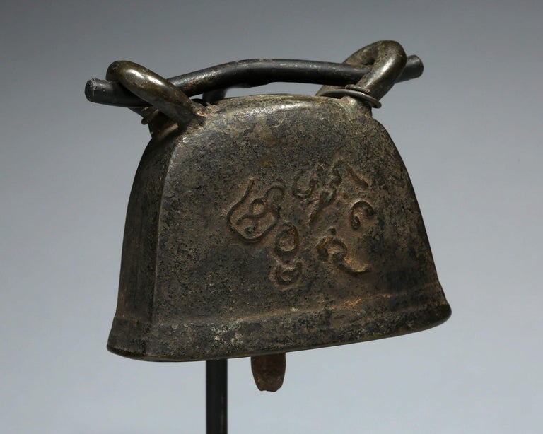 Thailand, Early 20th Century, Set of Three Brass Goat Bells on Stands