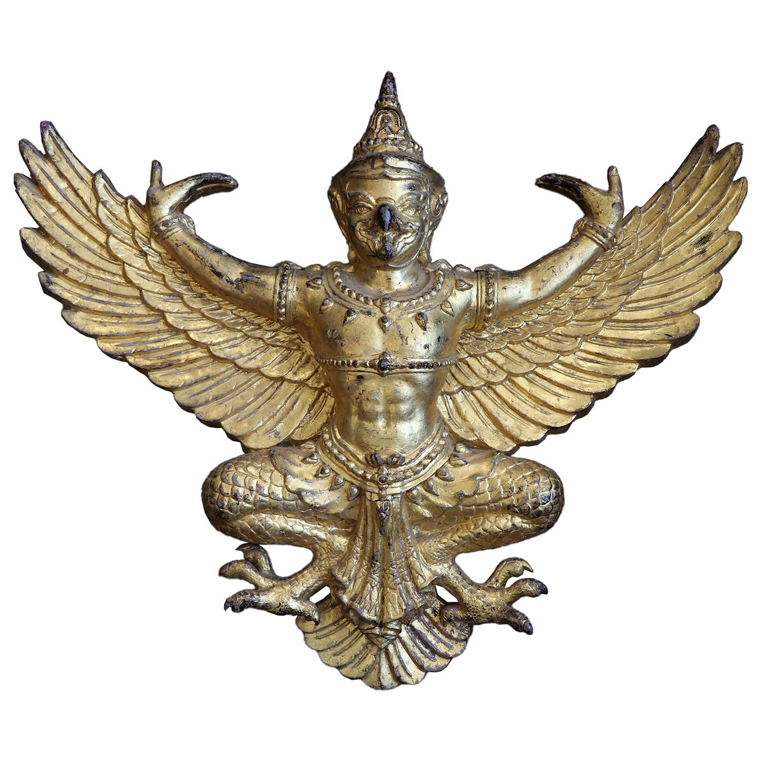 Garuda, a mythological half God half Beast, is the divine symbol of the Thai Monarch. In 1910, Garuda became the official emblem of Thailand, found on bank notes, flags above residences of royalty, and businesses in good standings. Normally in Red,