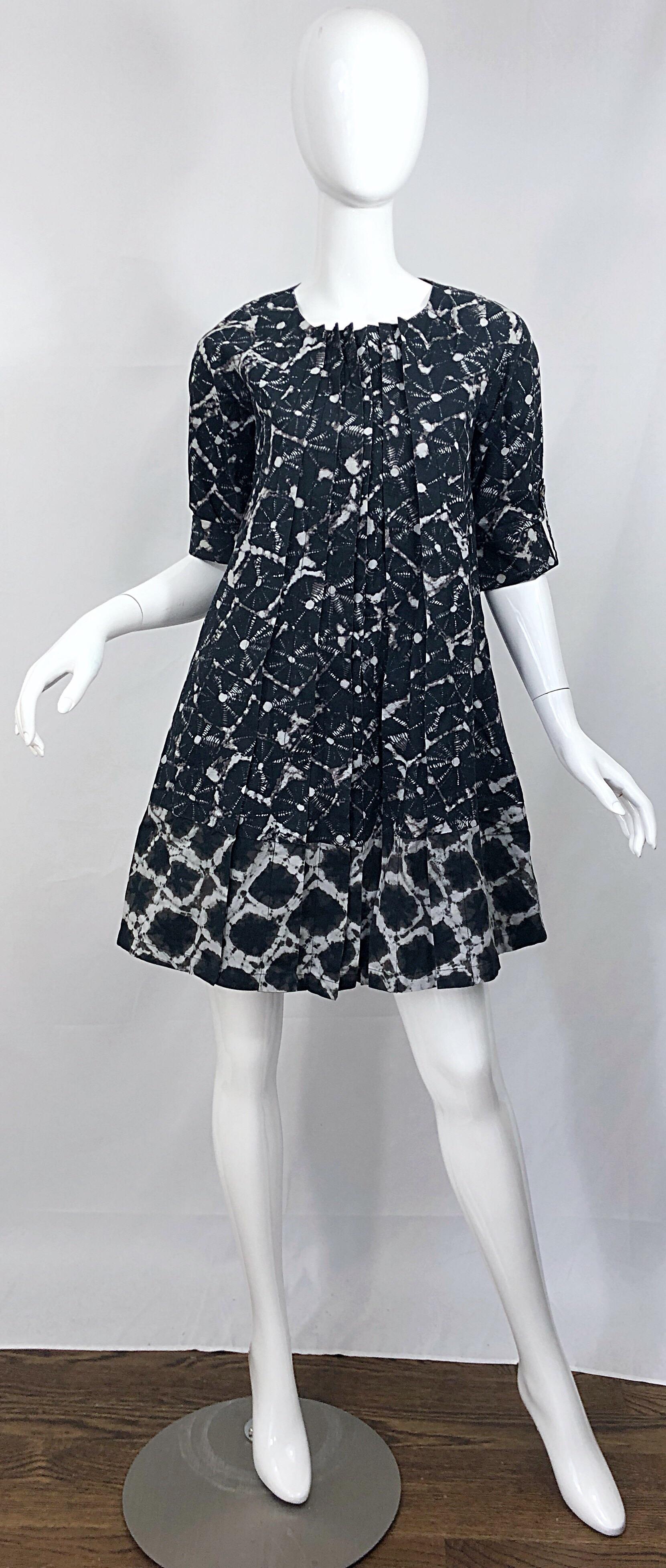 New THAKOON Spring 2008 black and white tie dye abstract print cotton trapeze swing dress / jacket! Features pleating up the front. Sleeves roll up with button strap closure. Hidden buttons up the front. POCKETS at each side of the hips. Can easily