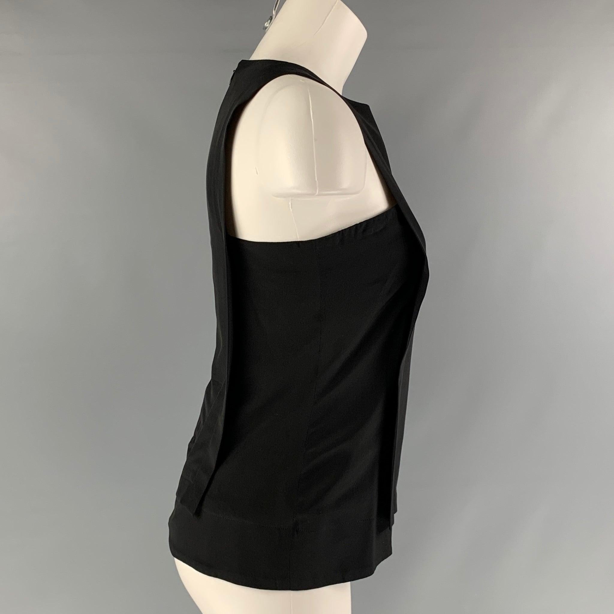 THAKOON sleeveless blouse comes in black silk fabric featuring a sleeveless style, and full zip up closure at center back.Excellent Pre-Owned Condition.  

Marked:   no size marked. 

Measurements: 
 
Shoulder: 9. 5 inches Bust: 34 inches Length: 22