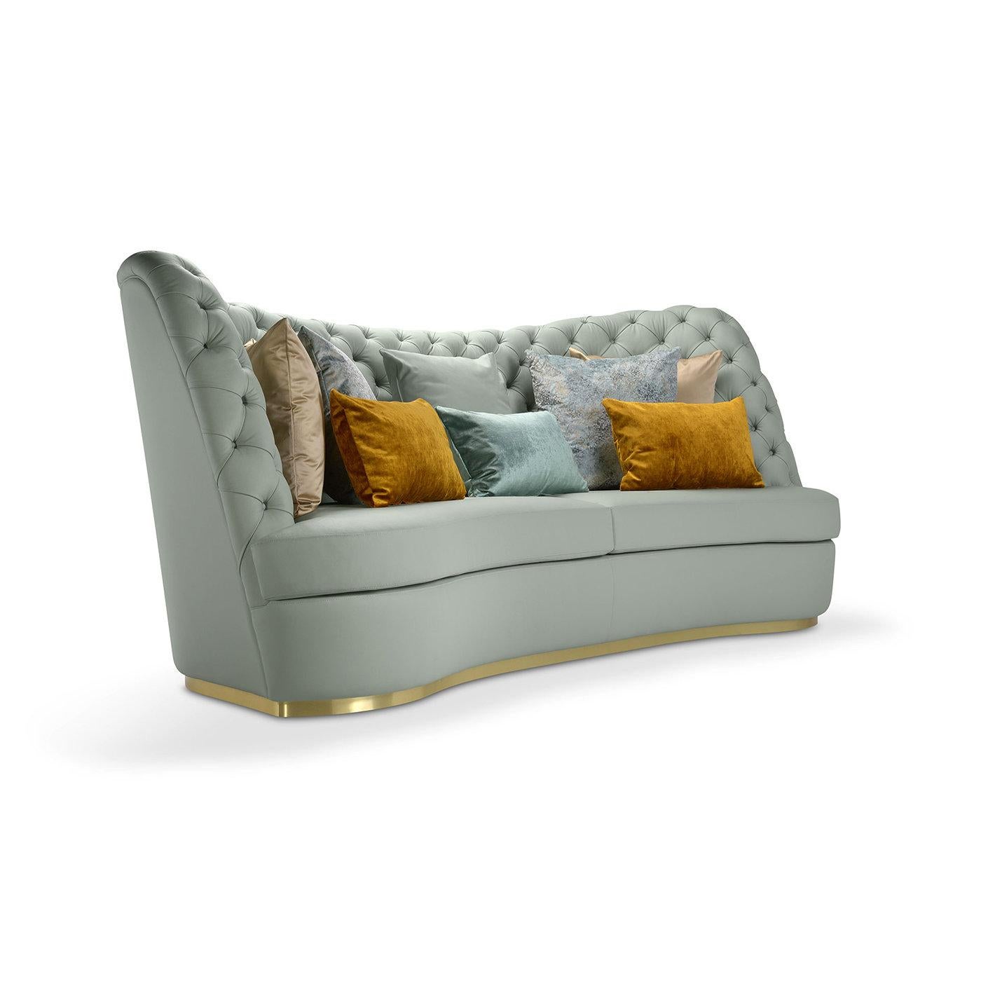 Named after Thalia, muse patron of comedy in Greek mythology, this four-seater sofa will not go unnoticed with its majestic, sartorial look. The abudantly padded wooden frame is upholstered in light-blue-hued leather awakening the senses of touch
