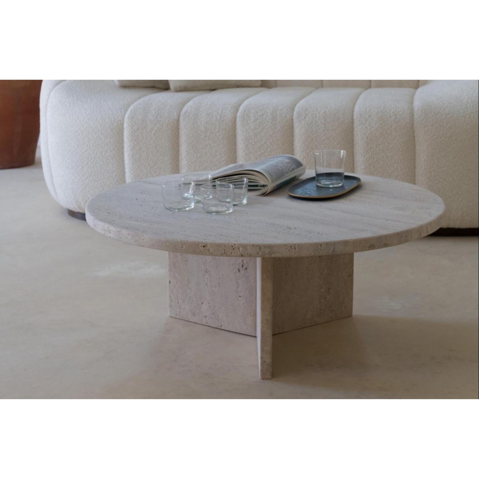 Thaly 100 Travertine Round Decorative Low Coffee Table by Beije Avenue
Dimensions: Ø 100 x H 40 cm. 
Materials: Travertine.

Available in different size options. Please contact us.

Our circular Thaly coffee table is the perfect blend of handcrafted