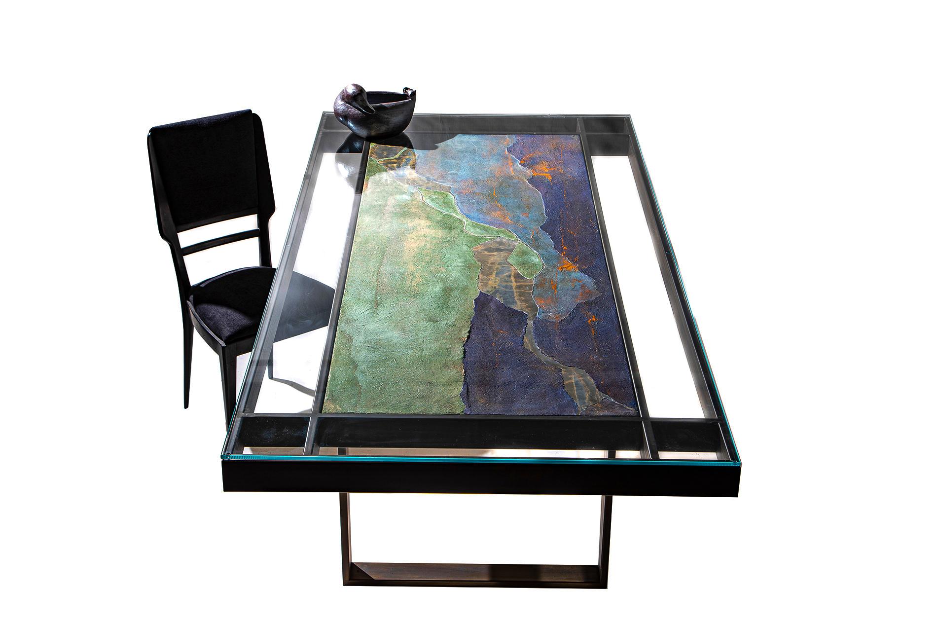 “THAT DAY BY THE LAKE” is a one-of-a-kind table designed and manufactured by KalaRara. Recalling days spent watching the light dapple across an aquatic landscape, the tabletop was created on canvas with composite of silica, sand, natural pigments