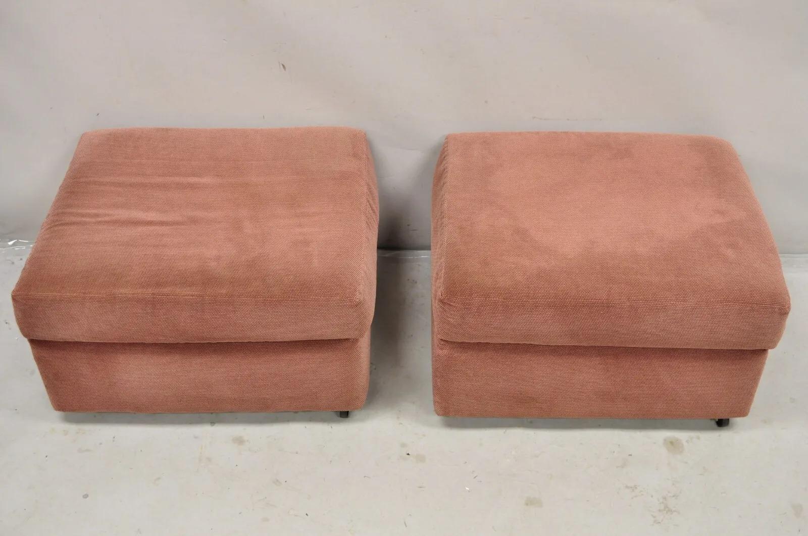 Thayer Coggin Modern Upholstered Mauve Color Ottomans on Wheels - a Pair. Circa Late 20th Century. Measurements: 16