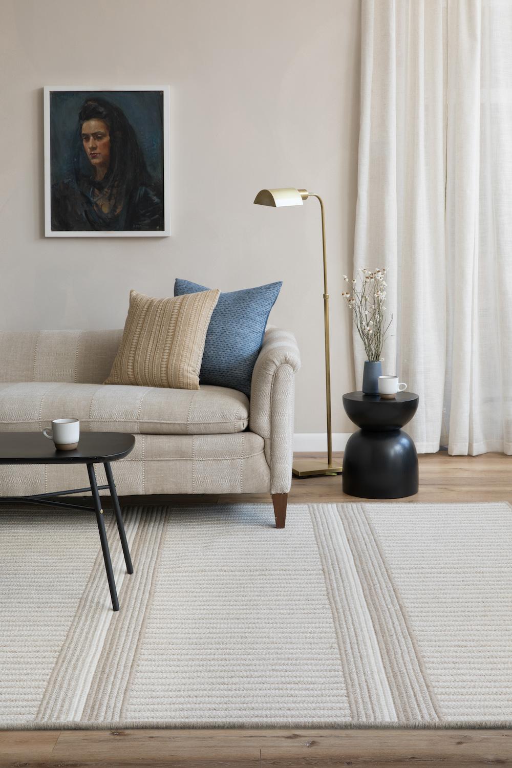 Alternating, stacked stripes of all natural wool color create a tonal pattern. Composed of thick, chunky cable-woven braids. Naturally durable and perfect for higher traffic areas. Measures : 6' x 9'.

Designed by Meredith Thayer in her South