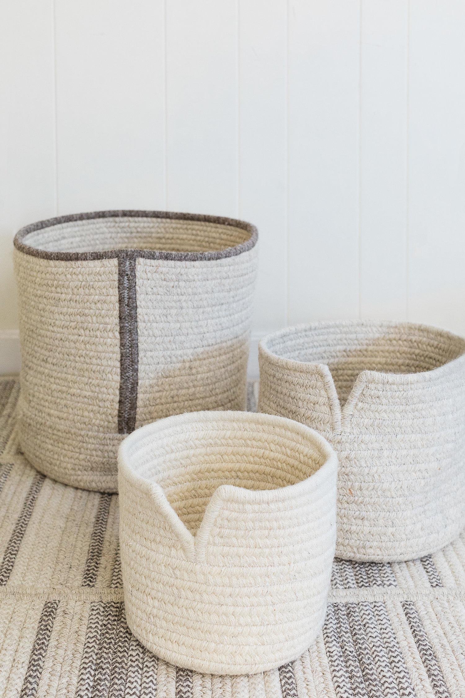 Created with a simple cut and finish binding, our Line Basket is made of flat woven braid. Light grey and dark grey natural un-dyed wool yarns are sewn with cotton thread.

Designed by Meredith Thayer in her South Boston studio and made to order