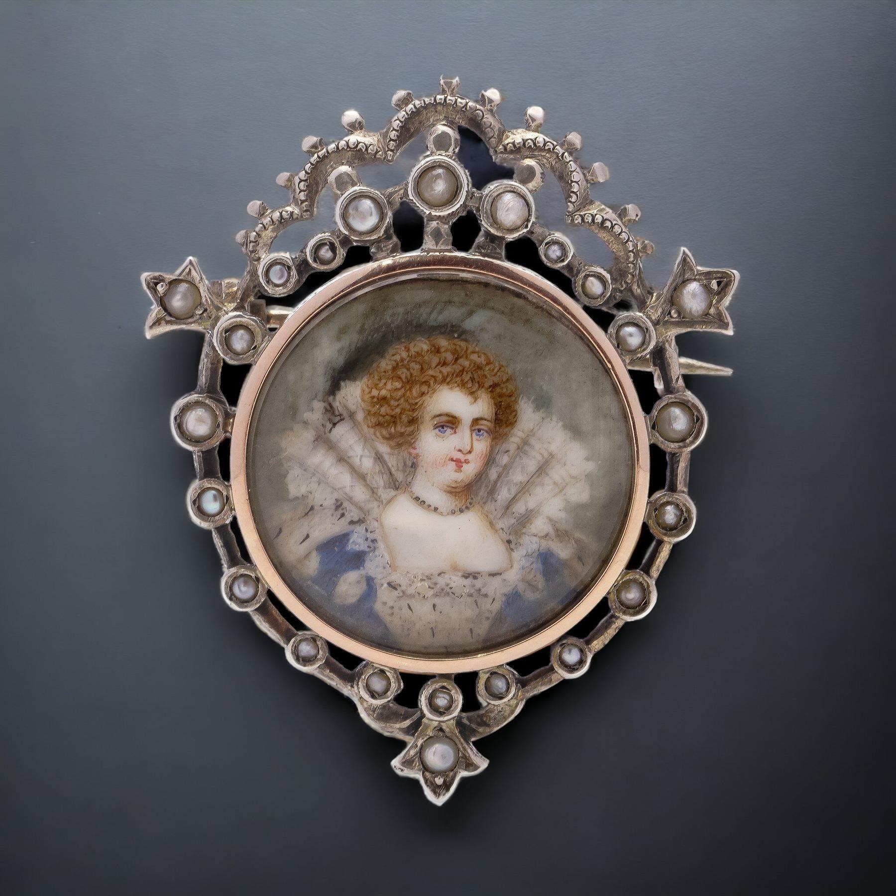 The 19th-century Victorian hand-painted watercolour miniature, exquisitely mounted in 9kt gold and silver and adorned with seed pearls, features a captivating portrayal of Anne of Denmark. This finely crafted artwork showcases Anne's regal demeanour