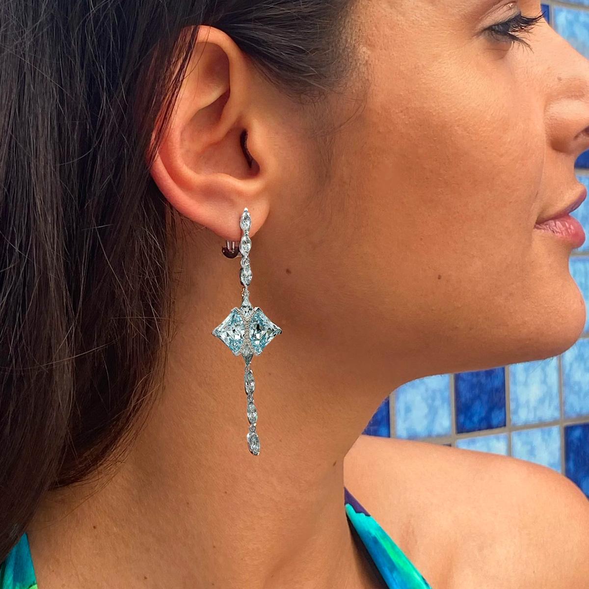 The magnificent eagle ray never fails to inspire us. A symbol of wisdom and grace, this elegant creature is a spirit guardian. Directly inspired by the ray’s form, the earrings are crafted with an assortment of fancy cut aquamarine sapphires. The