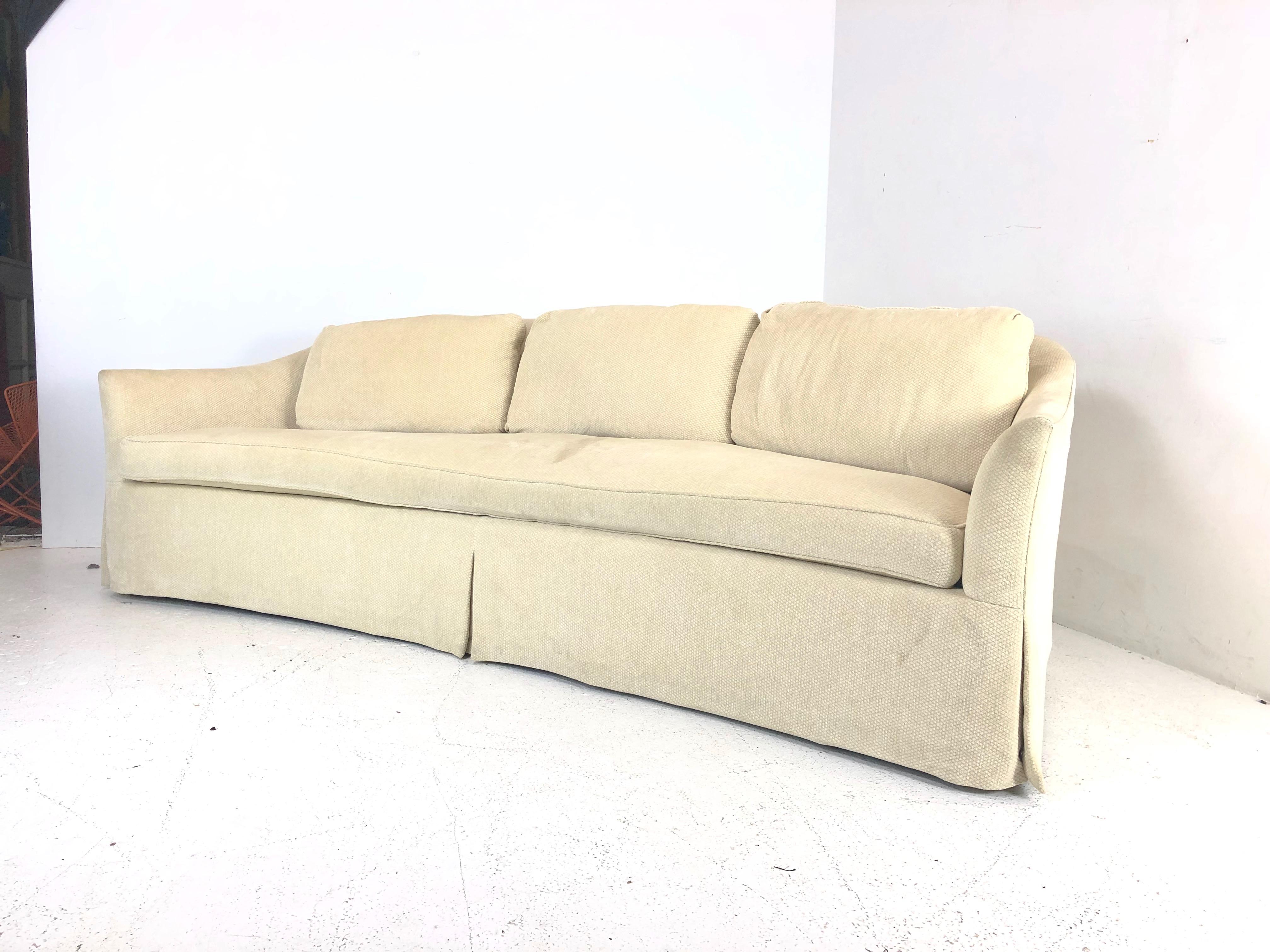 The 2719 curved sofa by A. Rudin. The sofa is sturdy and structurally sound and in good condition. Although in good condition new upholstery is suggested.

Dimensions:
97 W x 43 D x 32 H
Seat height 20.