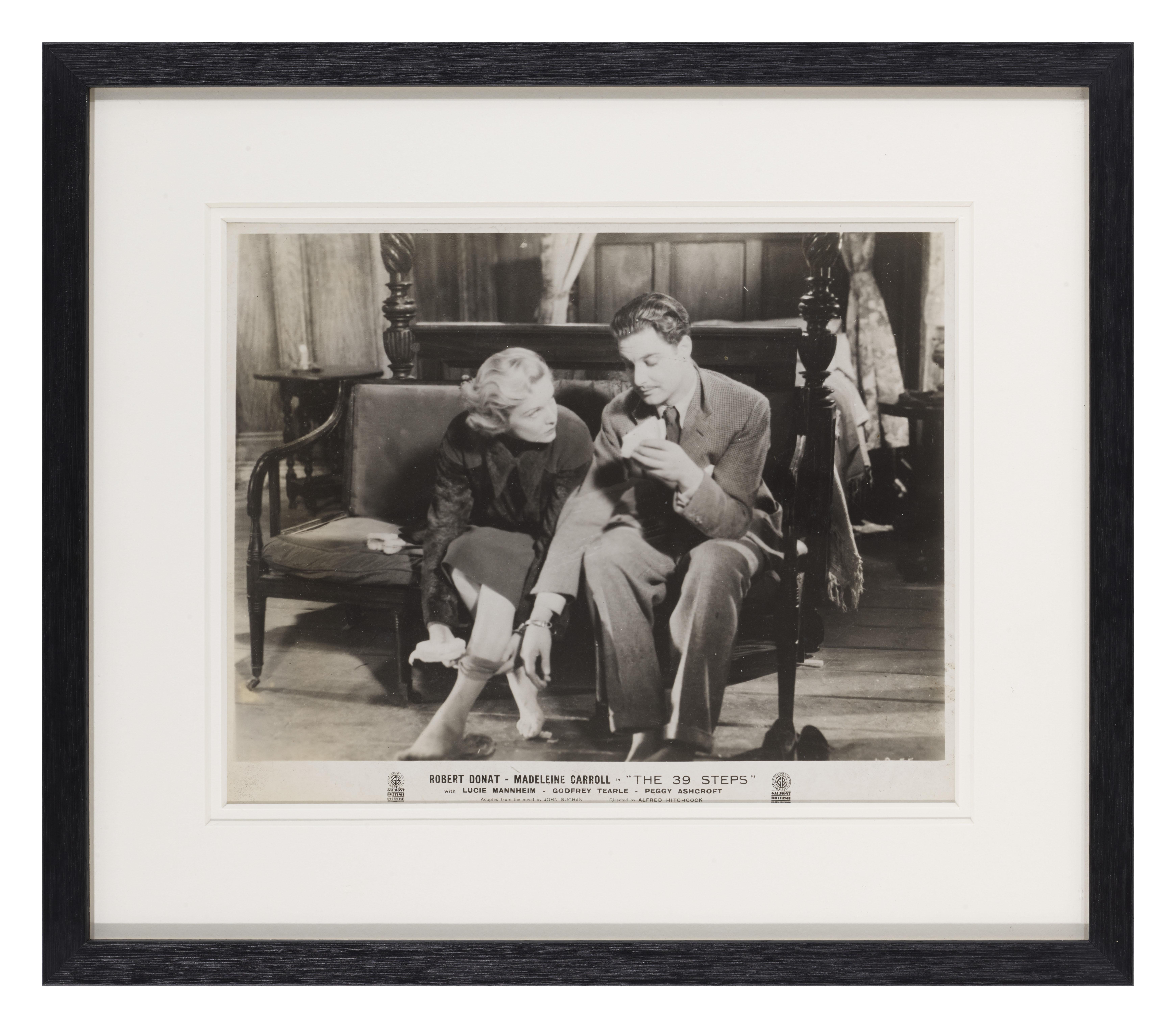 Original photographic production still for Alfred Hitchcock's 1935 crime thriller starring Robert Donat, Madeleine Carroll.
It is very difficult to find any original material on this legendary Hitchcock title.
This piece is Framed in a Sapele wood