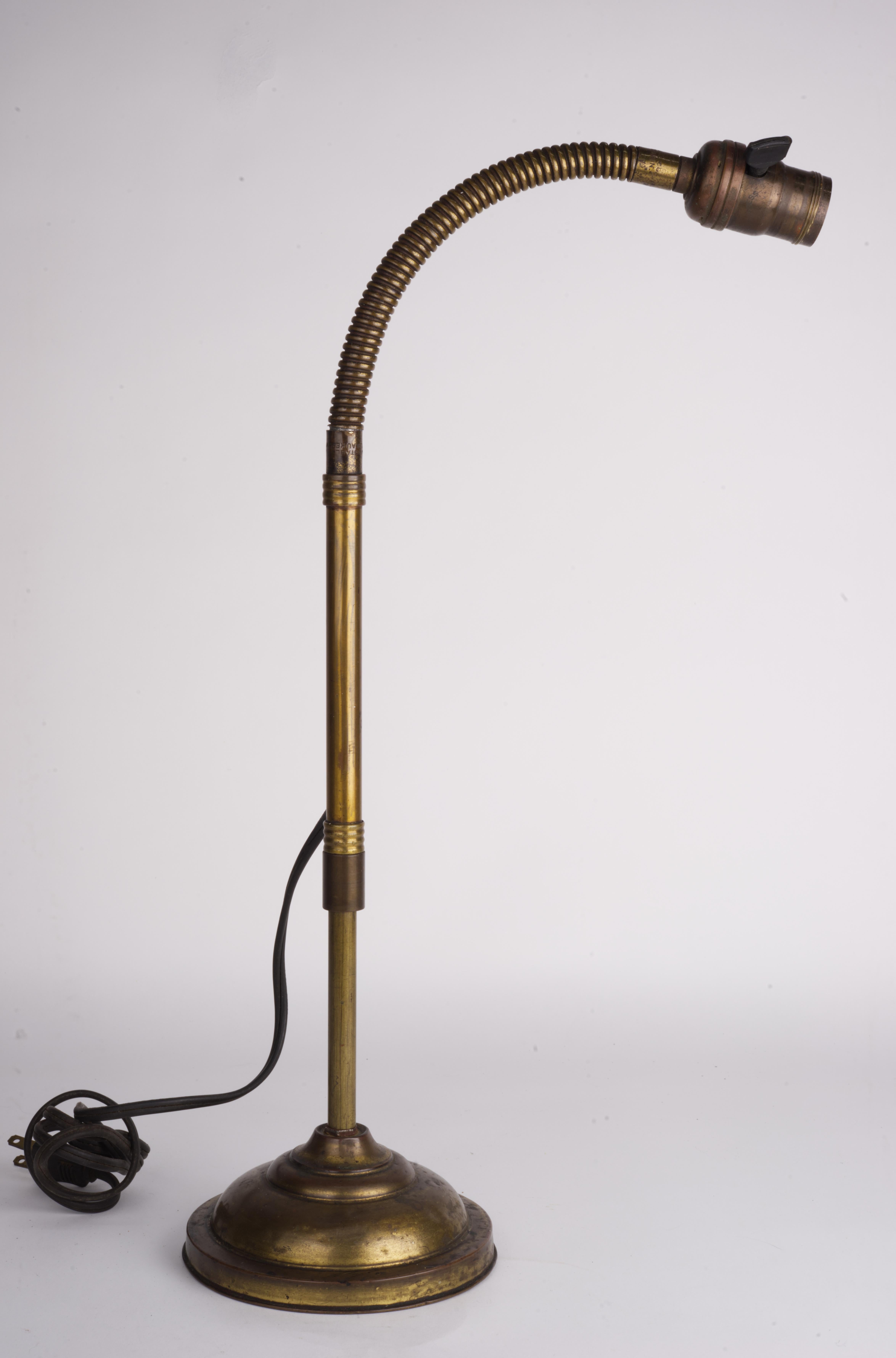 The Adjustable Fixture Co. was established in 1911 in  62 Mason St, Milwaukee , Wisconsin. 
Famous for premium residential and designer lighting  they also specialized in industrial and medical fixtures. 
Similar to #313 (Catalog #30, Tafco Line)