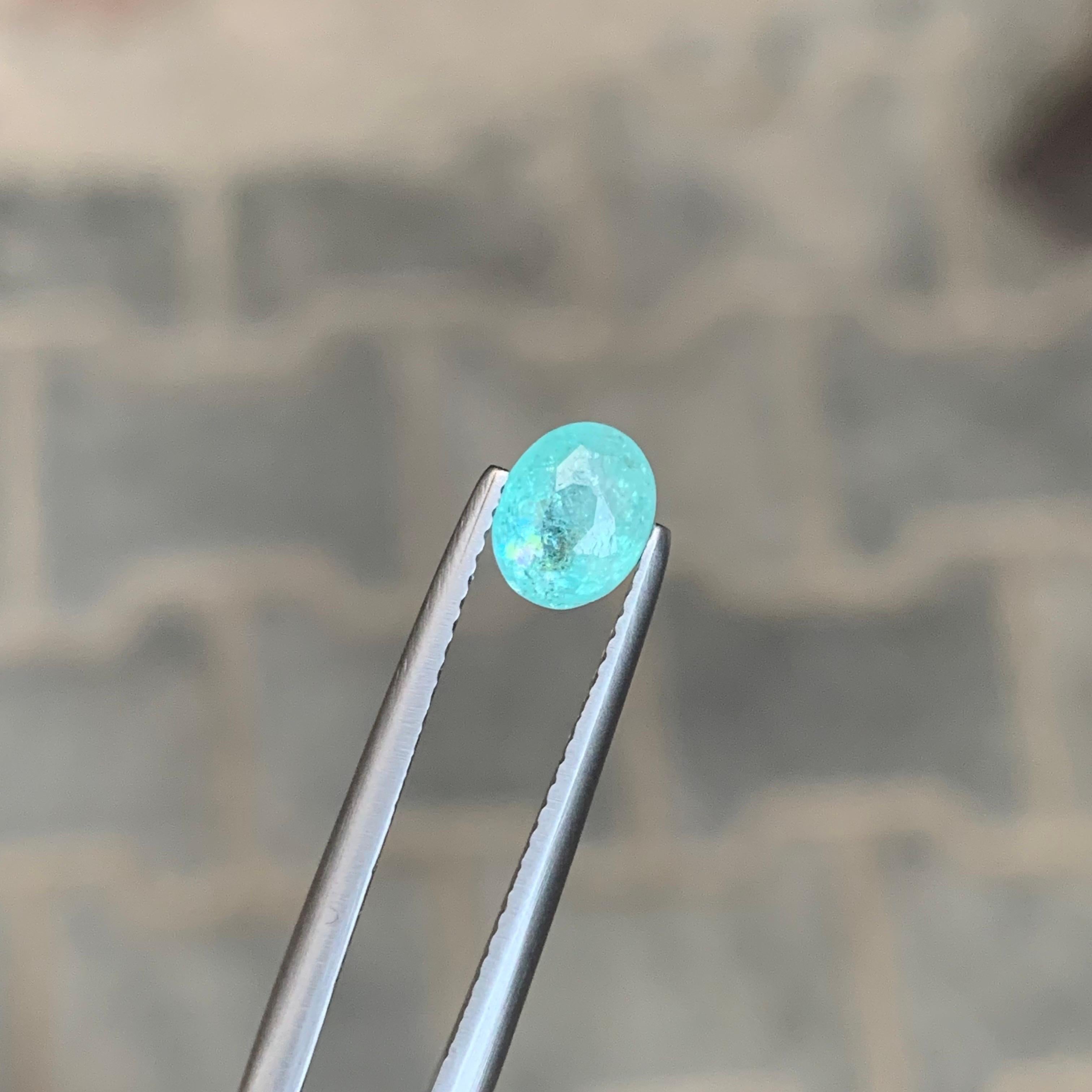 Gemma di forma ovale di tormalina Paraiba sciolta naturale certificata AIG da 0,98 carati in vendita 5