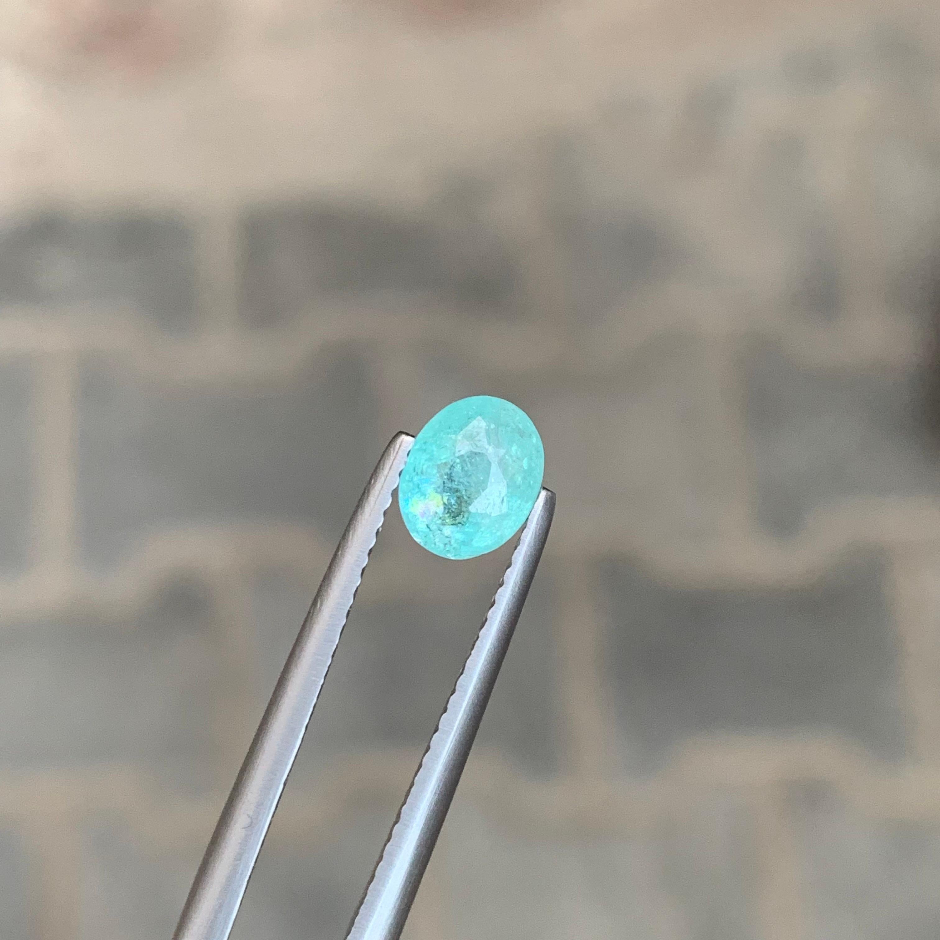 Gemma di forma ovale di tormalina Paraiba sciolta naturale certificata AIG da 0,98 carati in vendita 6